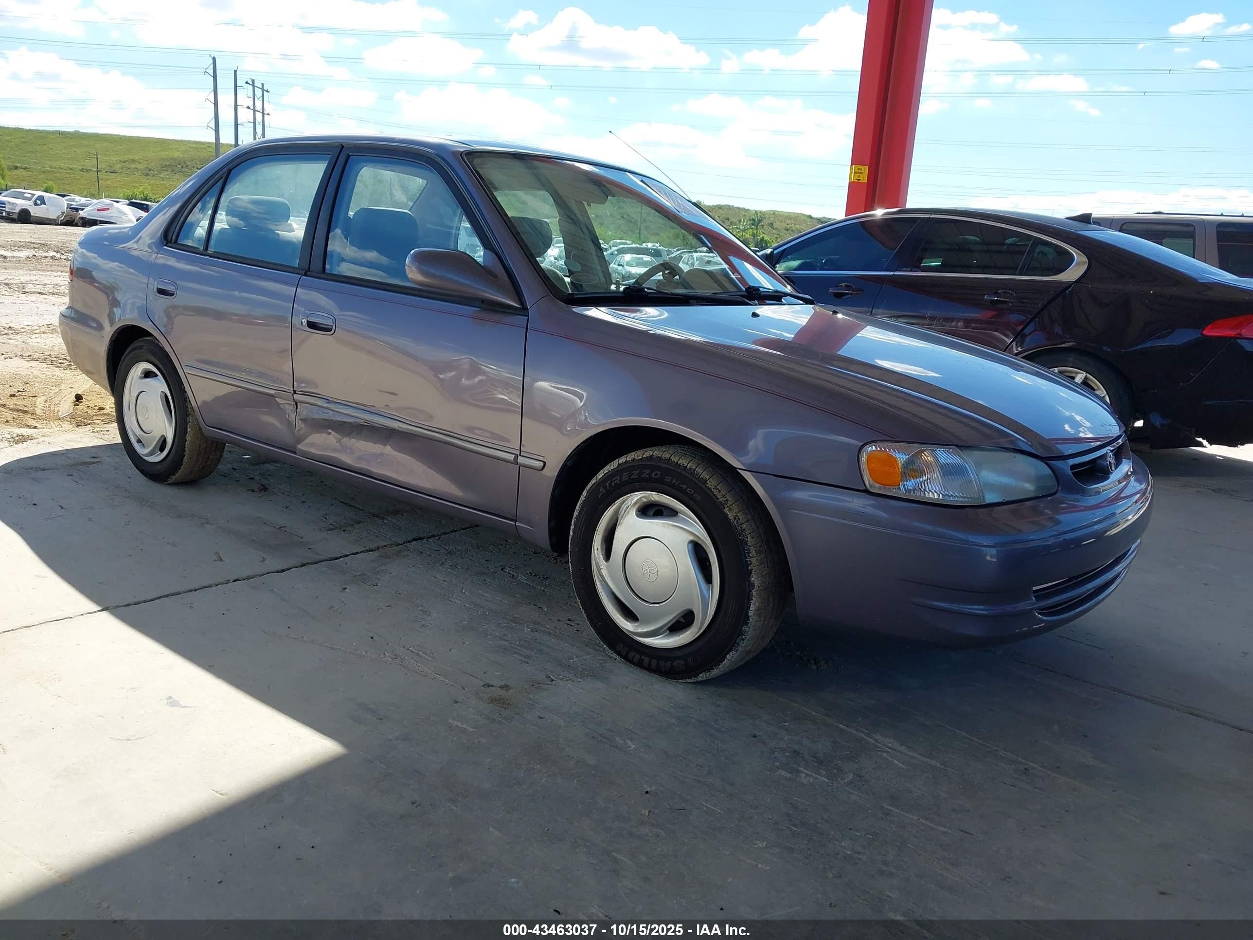 1998 Toyota Corolla LE, VIN 2T1BR18E5WC024281 — Side