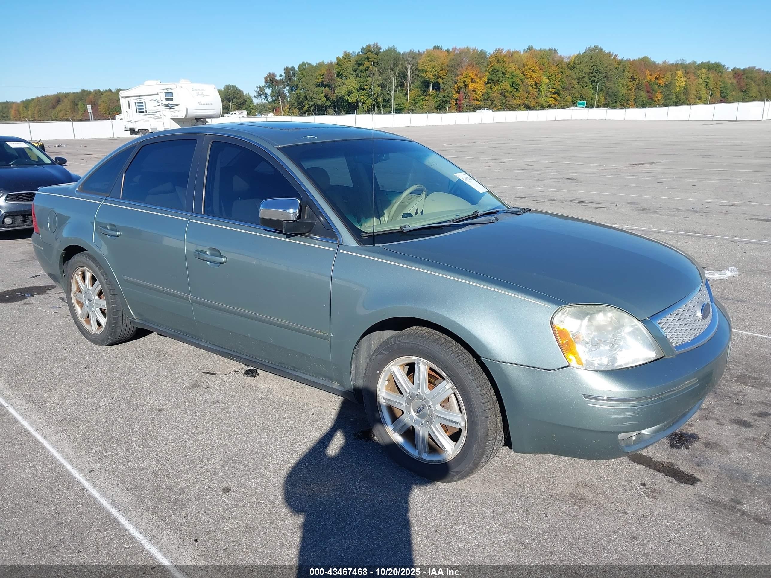 2005 Ford Five Hundred Limited, VIN 1FAHP28155G155672 — Side