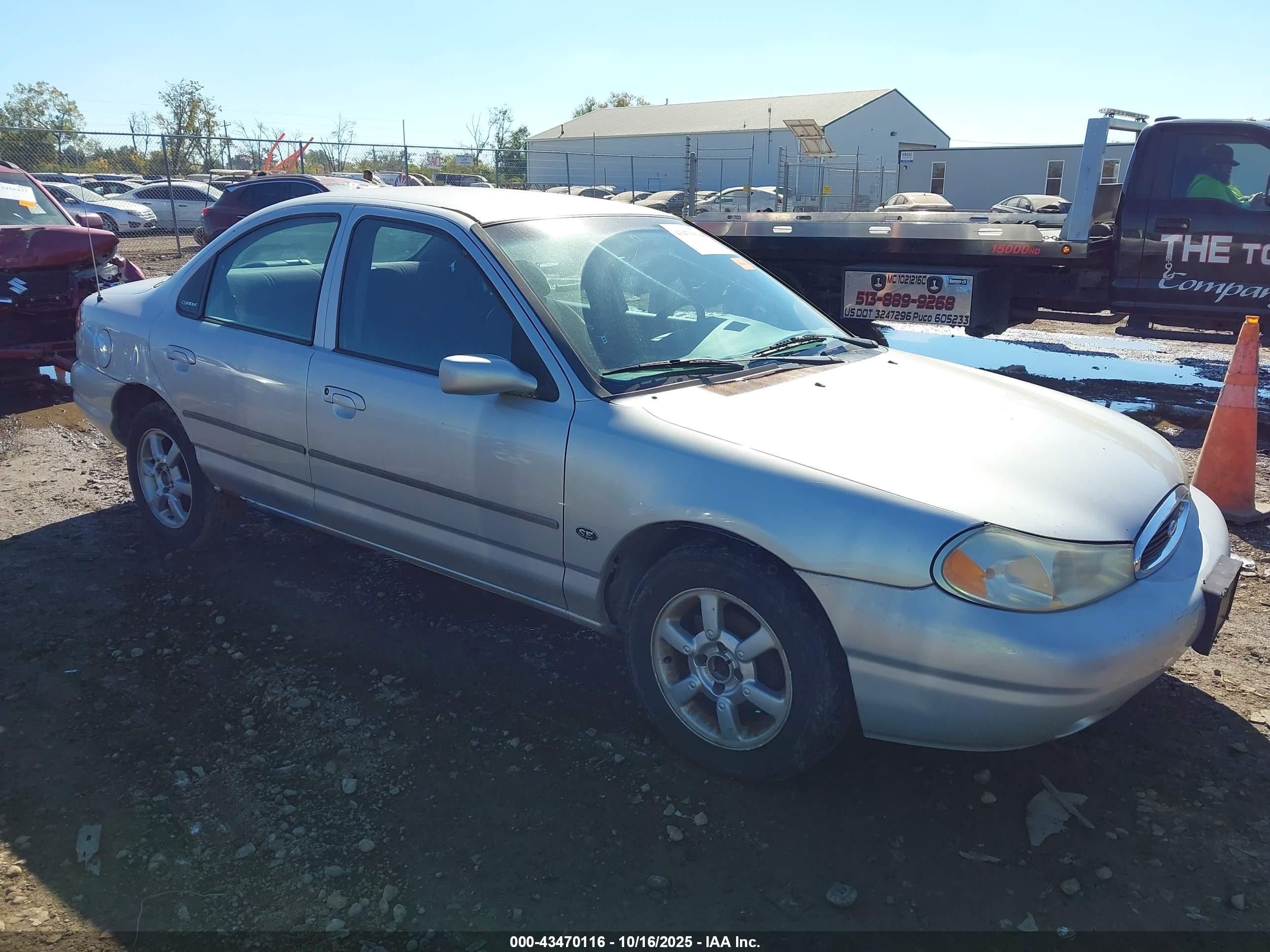 1999 Ford Contour SE, VIN 1FAFP6639XK133693 — Side