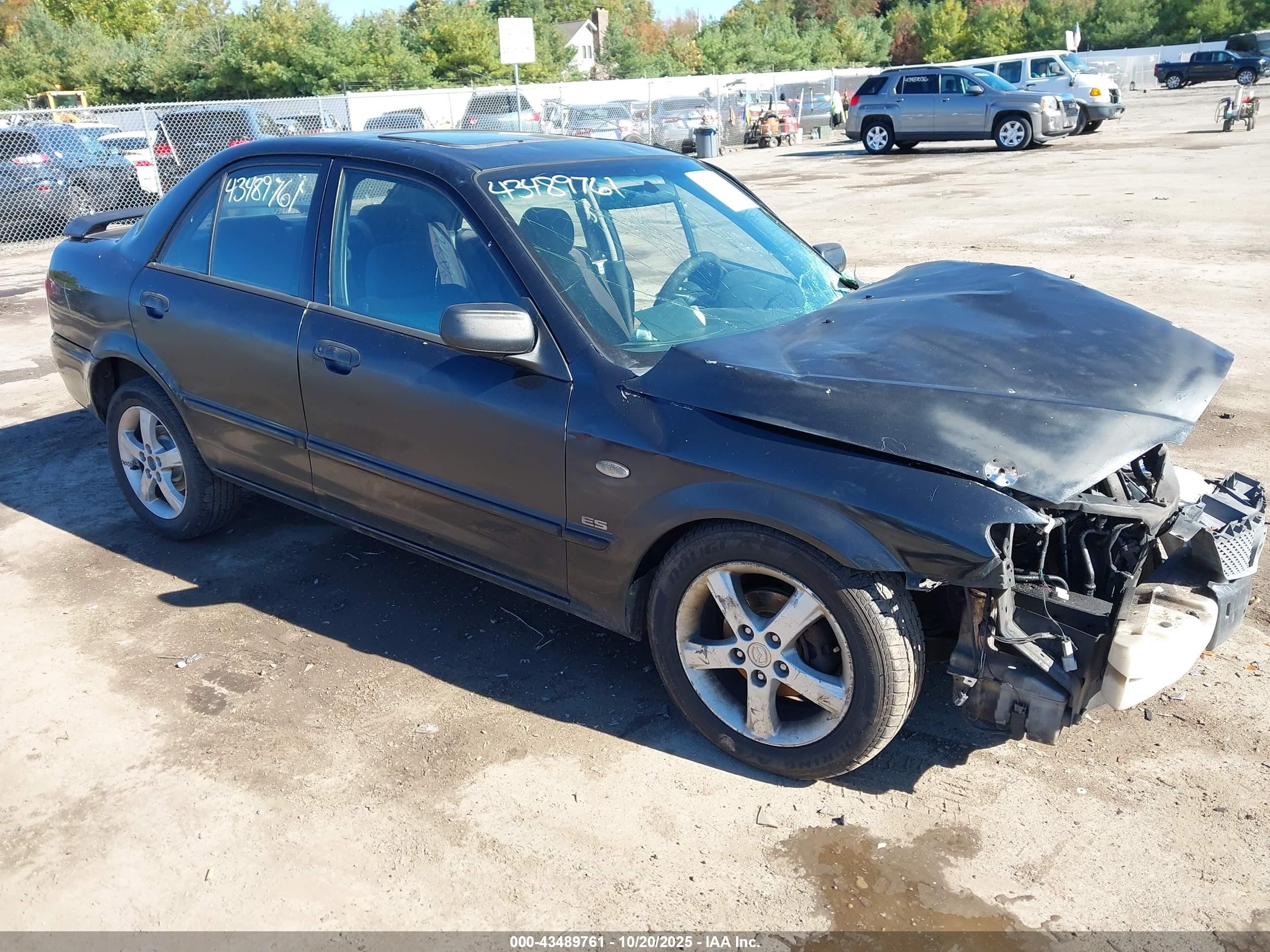 2002 Mazda Protege DX, VIN JM1BJ225721606483 — Front end