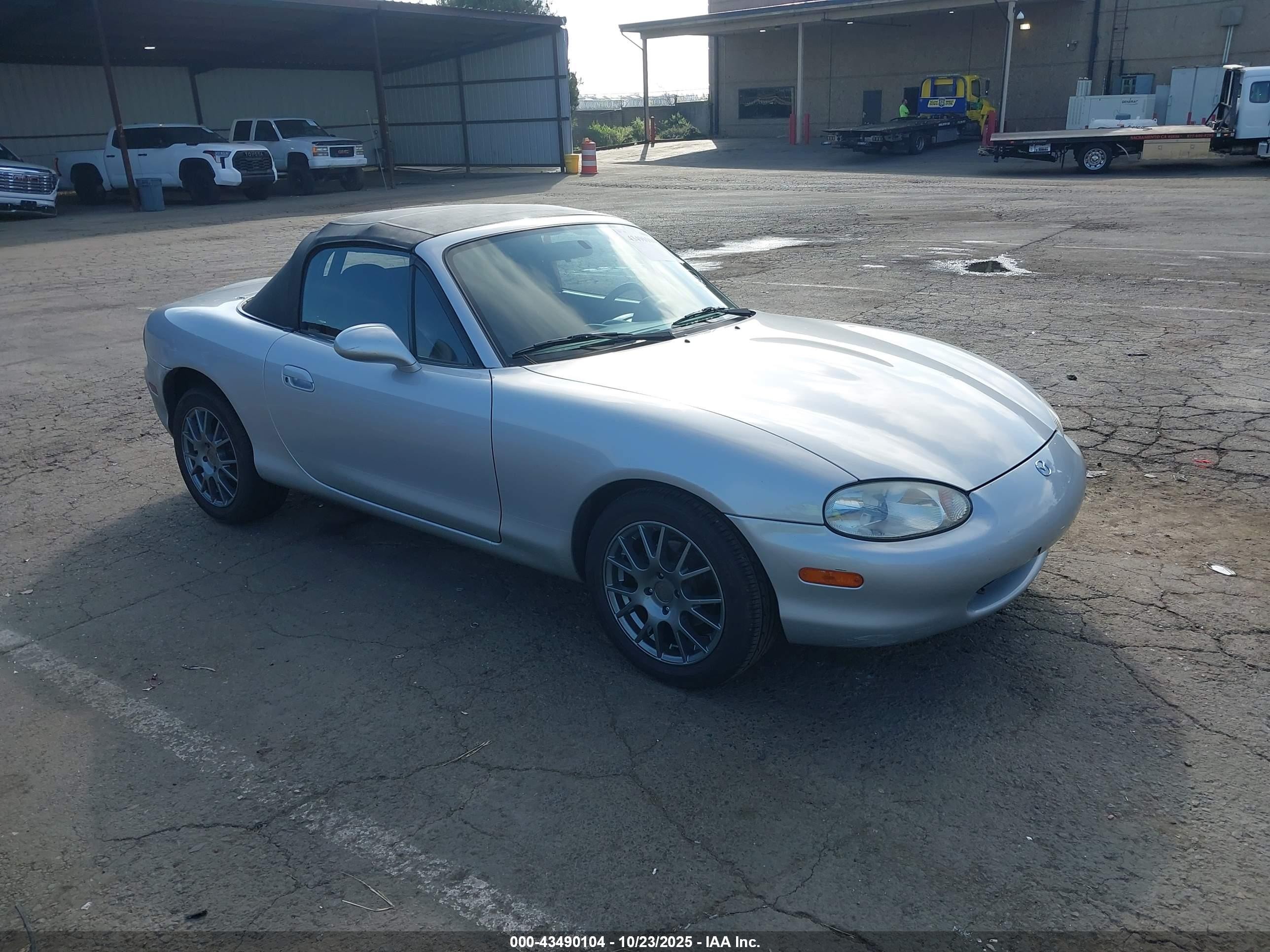1999 Mazda MX-5 Miata, VIN JM1NB3530X0102896 — Side