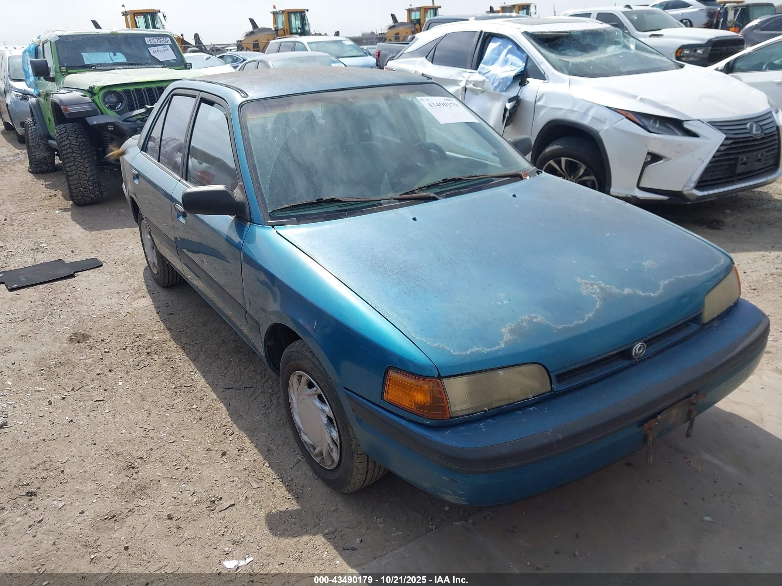 1994 Mazda Protege DX, VIN JM1BG2243R0739361 — Бок