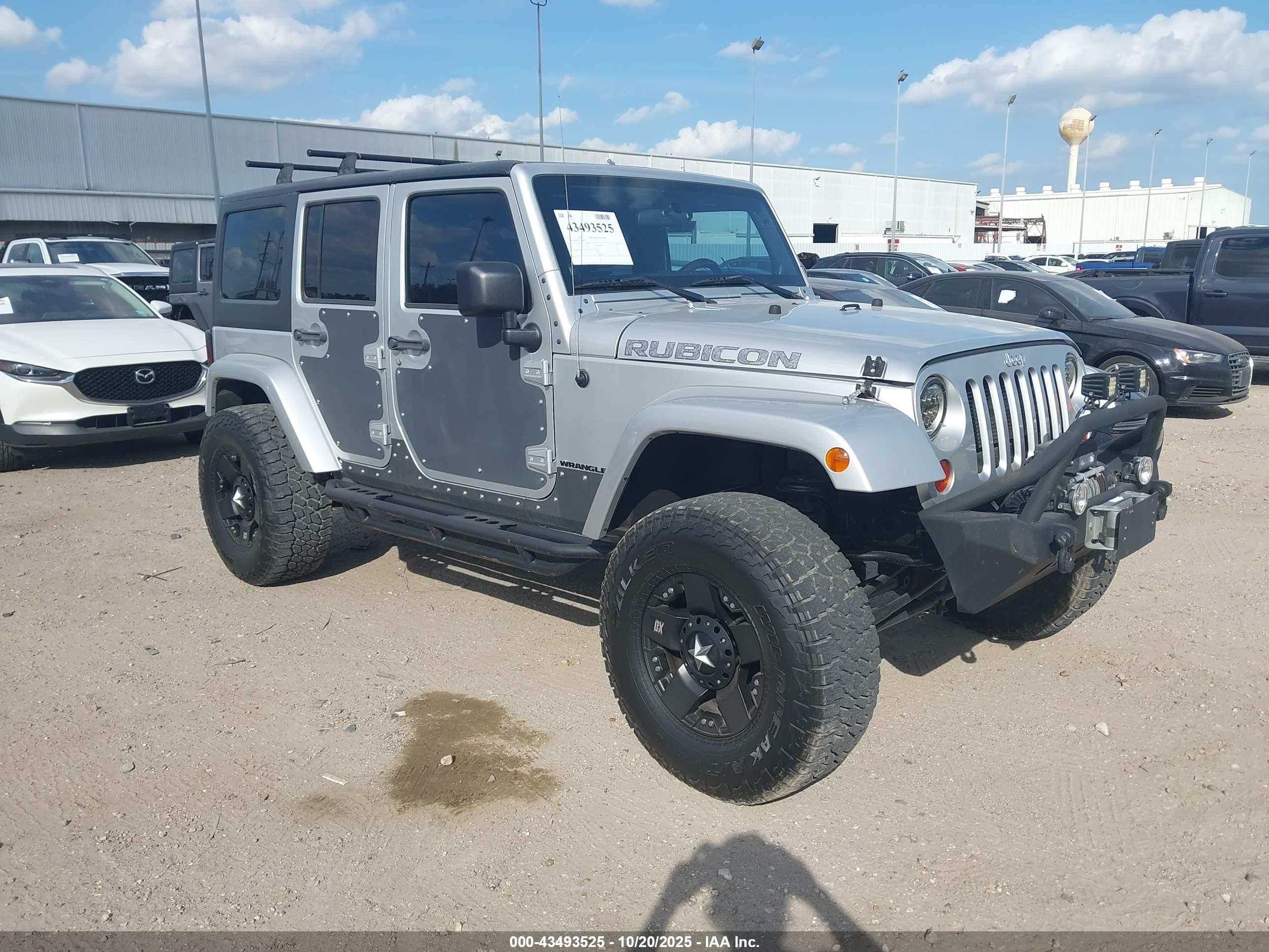 2012 Jeep Wrangler Unlimited Rubicon, VIN 1C4BJWFG7CL281844 — Фото с аукциона