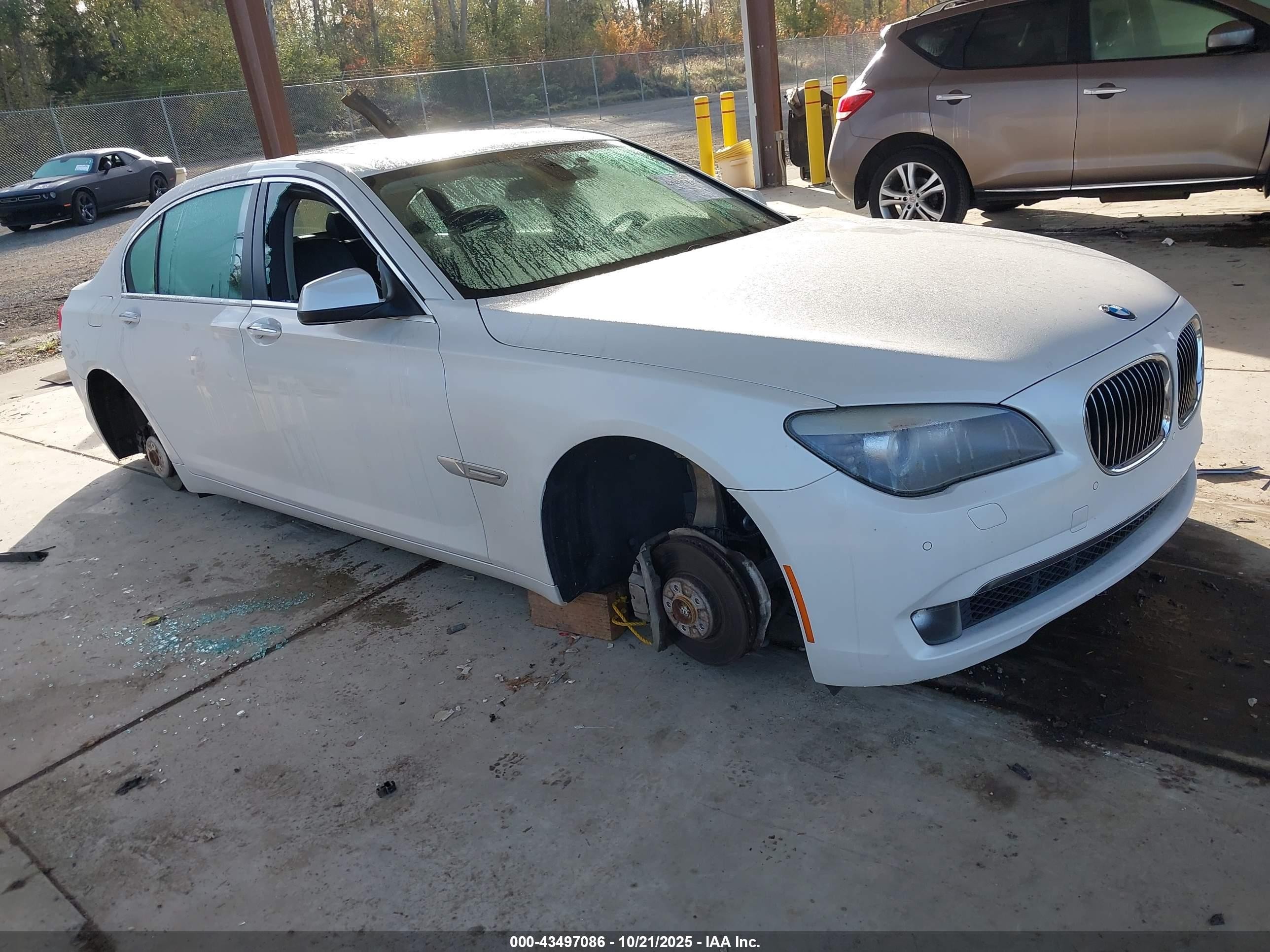 2011 BMW 7 Series 740Li, VIN WBAKB4C50BC392946 — Side