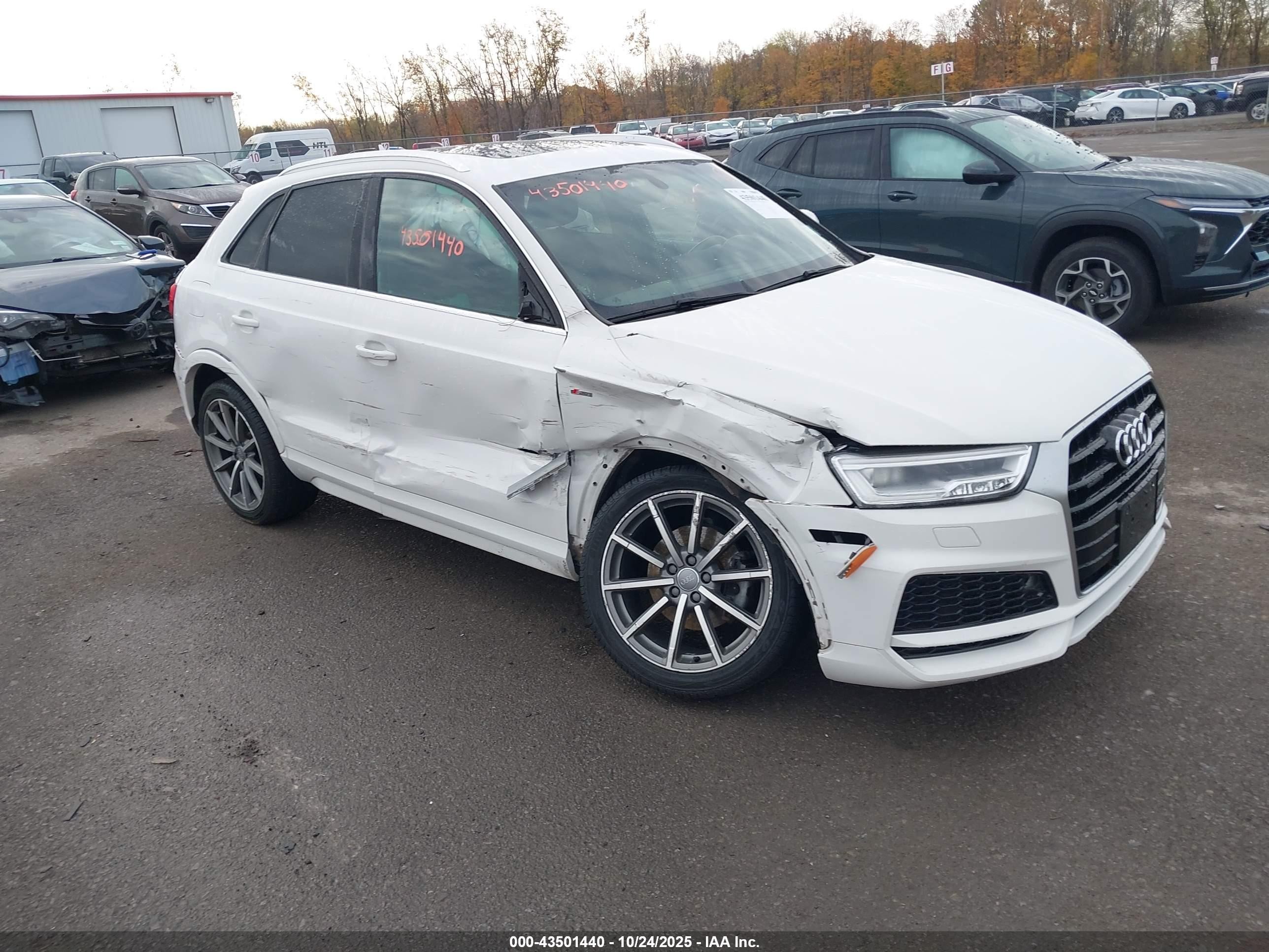 2018 Audi Q3 Premium Plus, VIN WA1JCCFS9JR026318 — Undercarriage