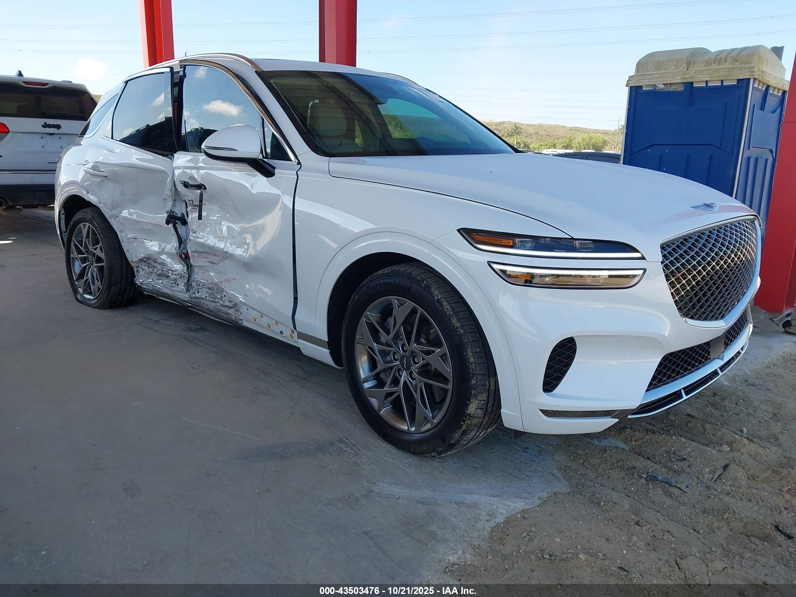 2023 Genesis GV70 2.5T, VIN KMUMADTB6PU117164 — Side