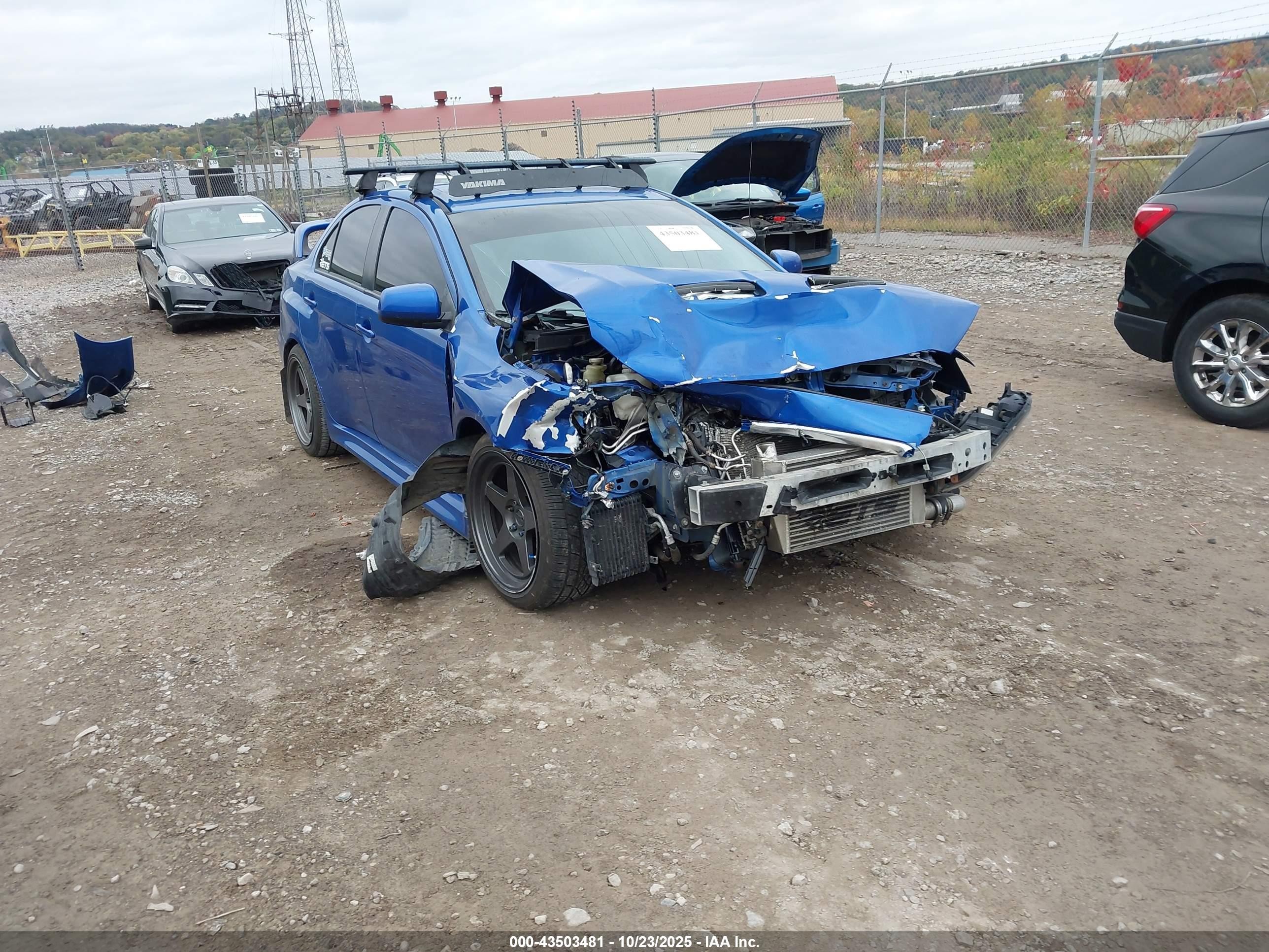 2012 Mitsubishi Lancer Evolution GSR, VIN JA32W8FV6CU028552 — Front end
