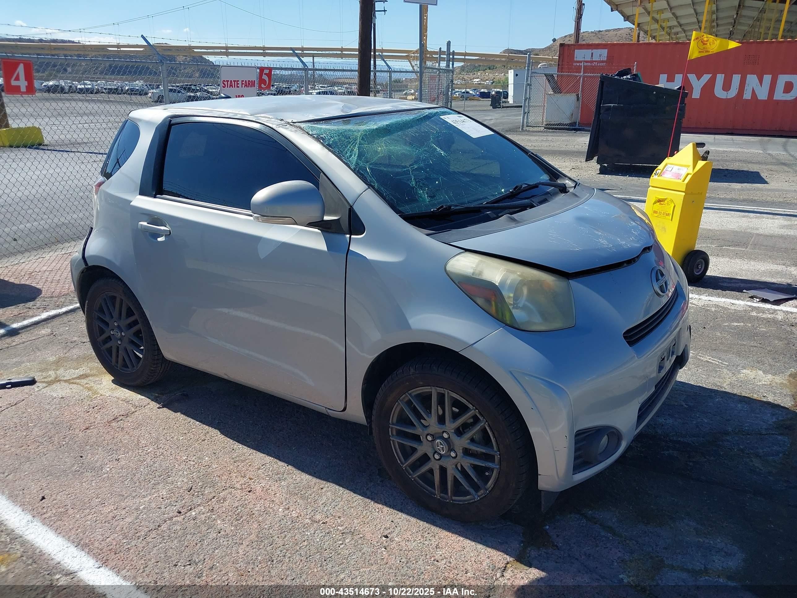2014 Scion iQ, VIN JTNJJXB04EJ026525 — Rollover