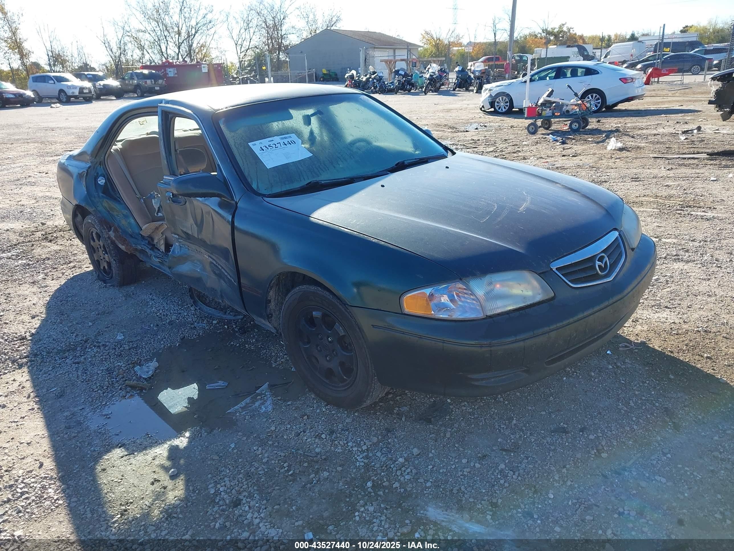 2001 Mazda 626, VIN 1YVGF22E815218154 — Бок
