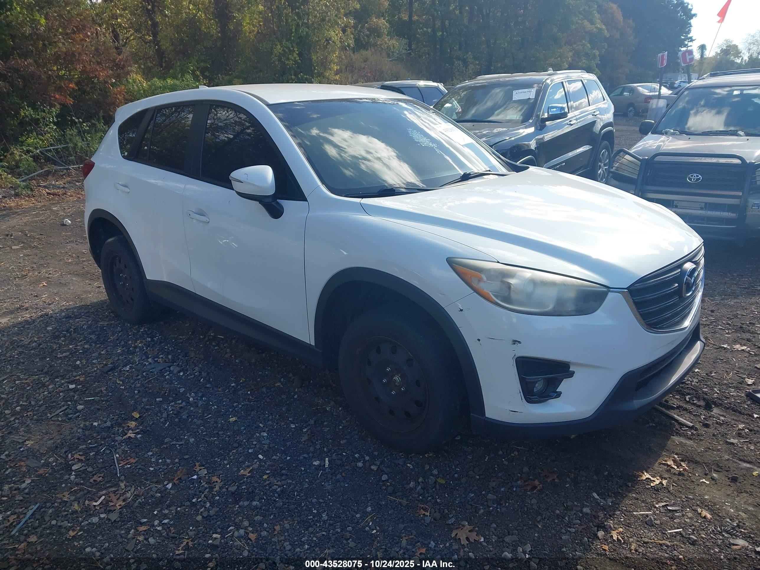 2016 Mazda CX-5 Touring, VIN JM3KE2CY4G0728994 — Interior fire