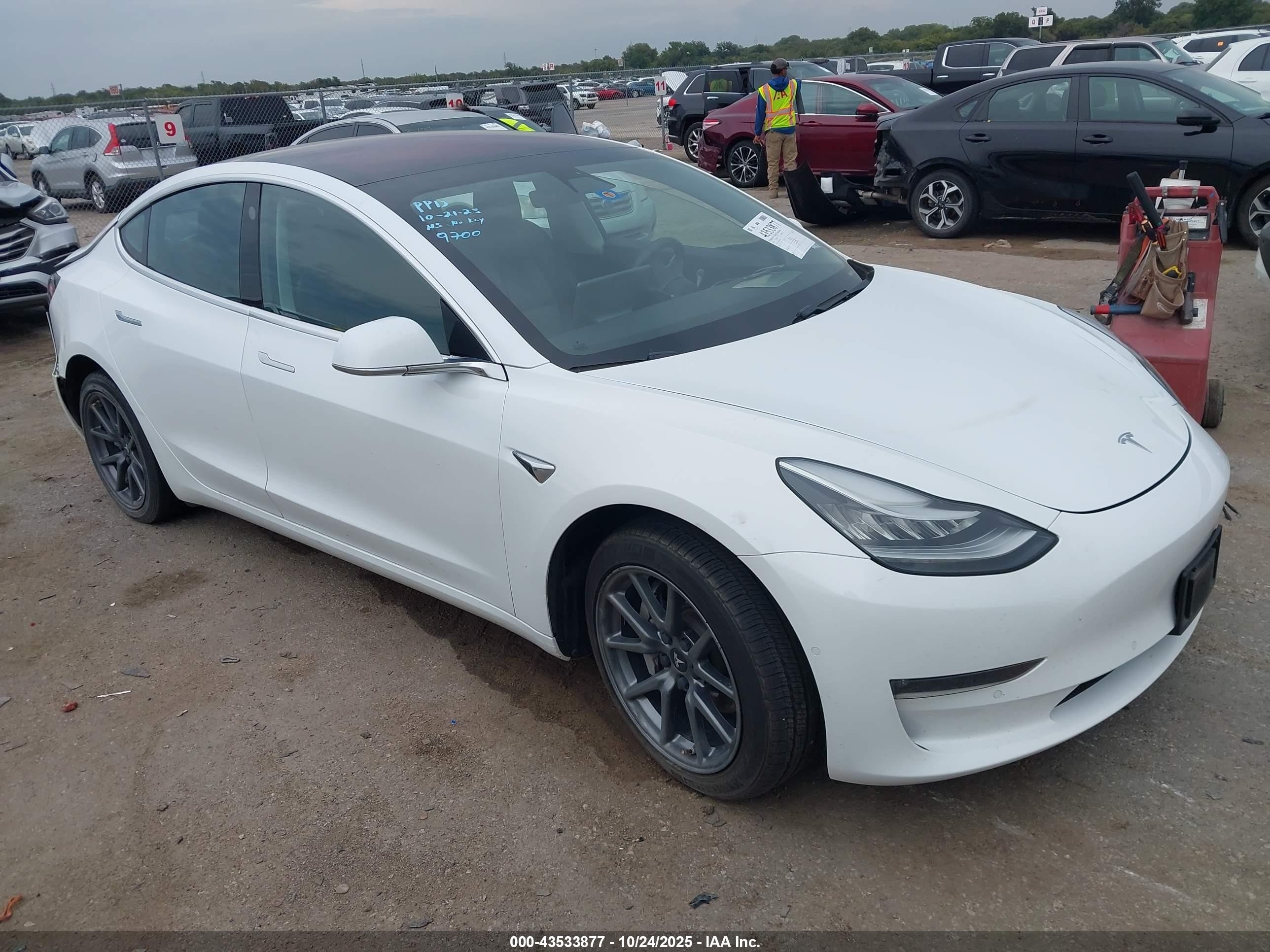 2018 Tesla Model 3 Long Range Battery, VIN 5YJ3E1EA1JF059700 — Rear end