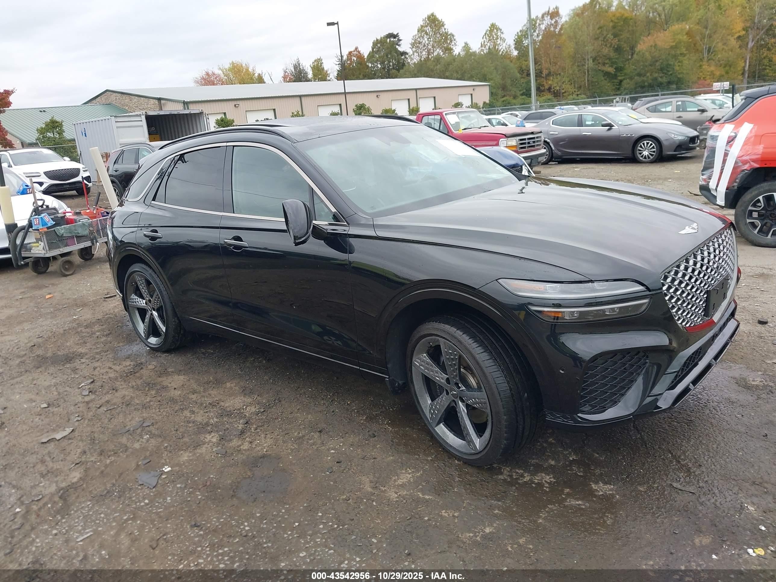 2023 Genesis GV70 Sport, VIN KMUMCDTC5PU096939 — Side