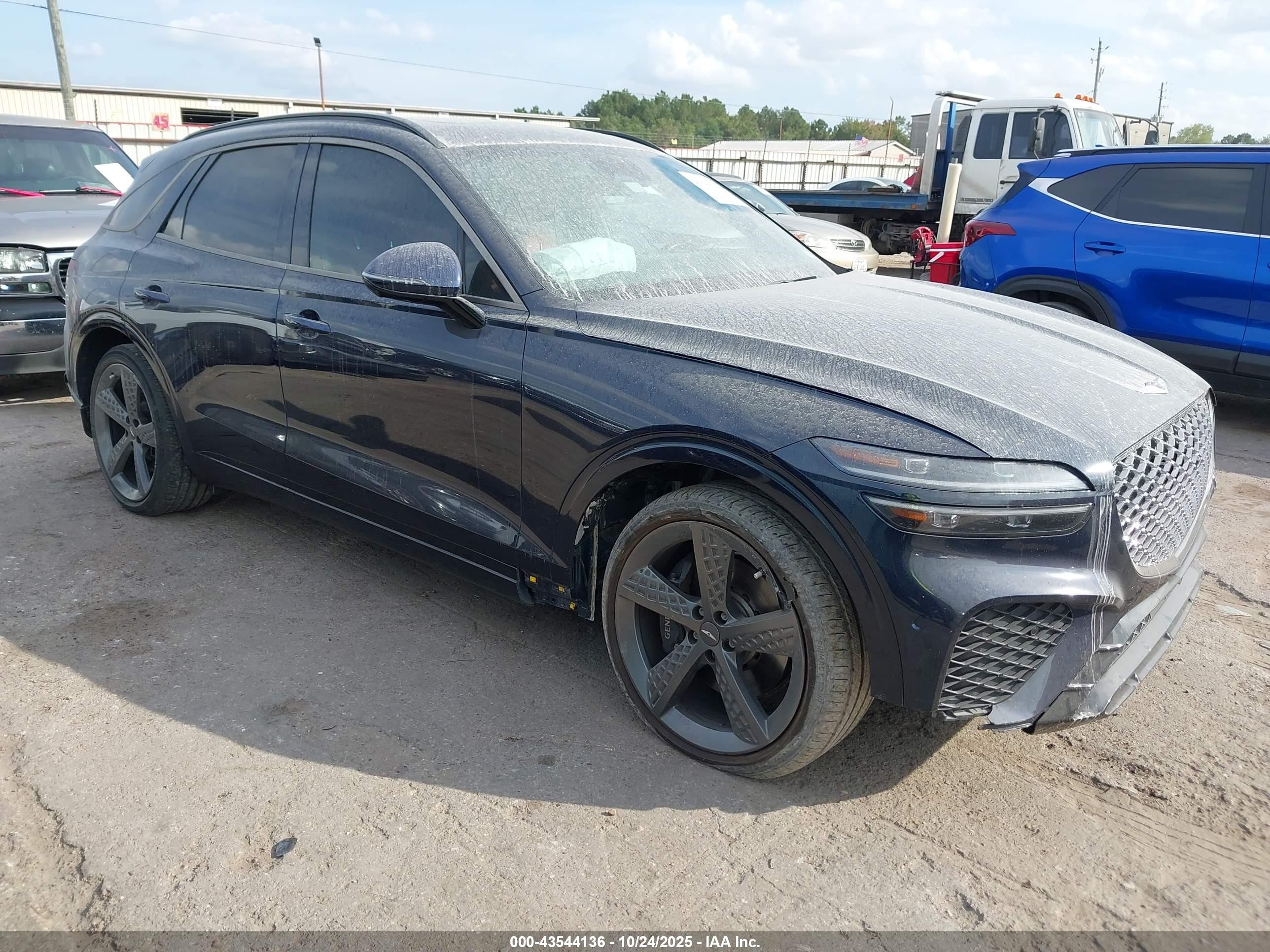 2023 Genesis GV70 2.5T, VIN KMUMADTB1PU106735 — Undercarriage