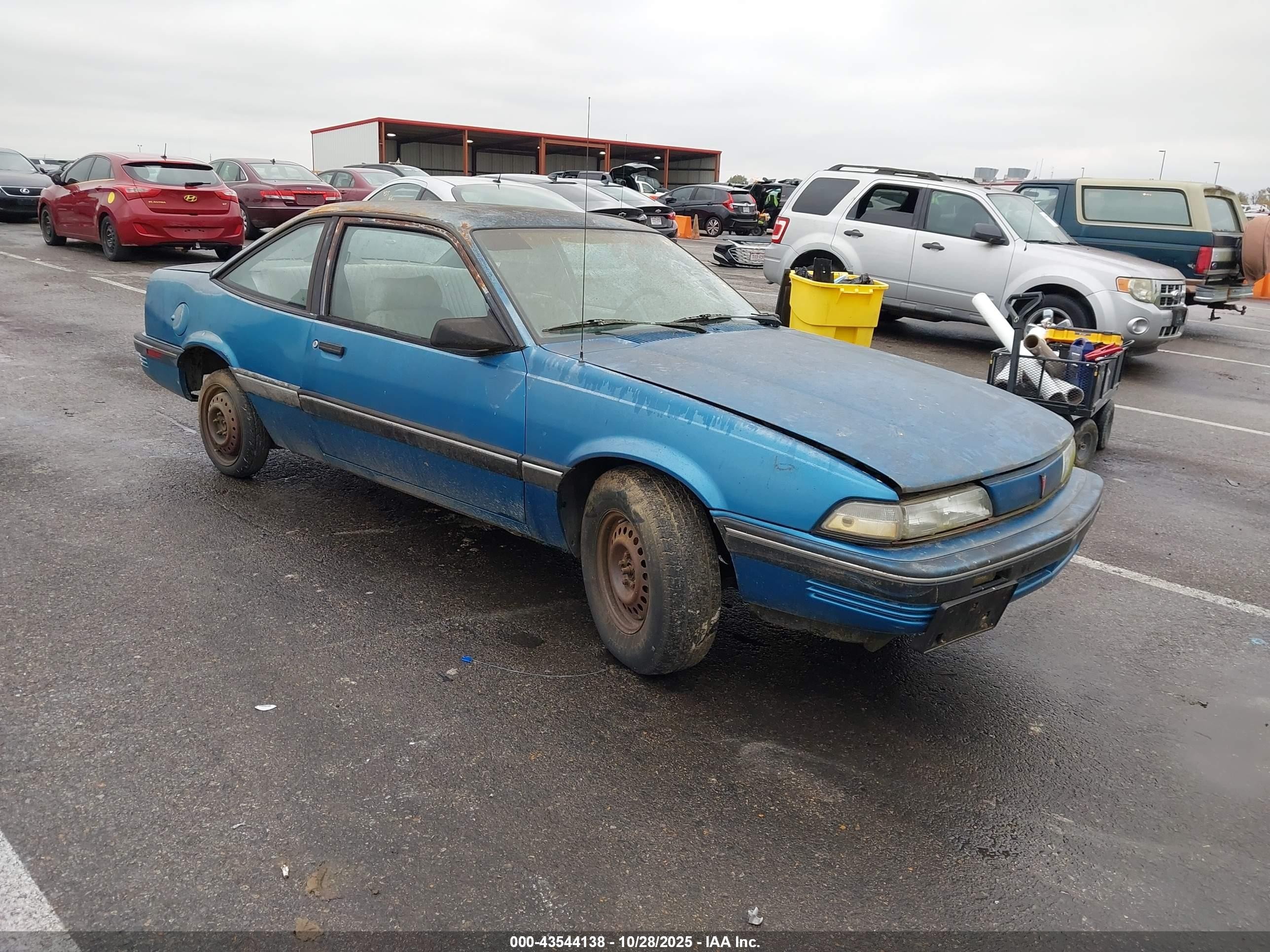 1989 Pontiac Sunbird, VIN 1G2JB11K2K7632386 — Normal wear