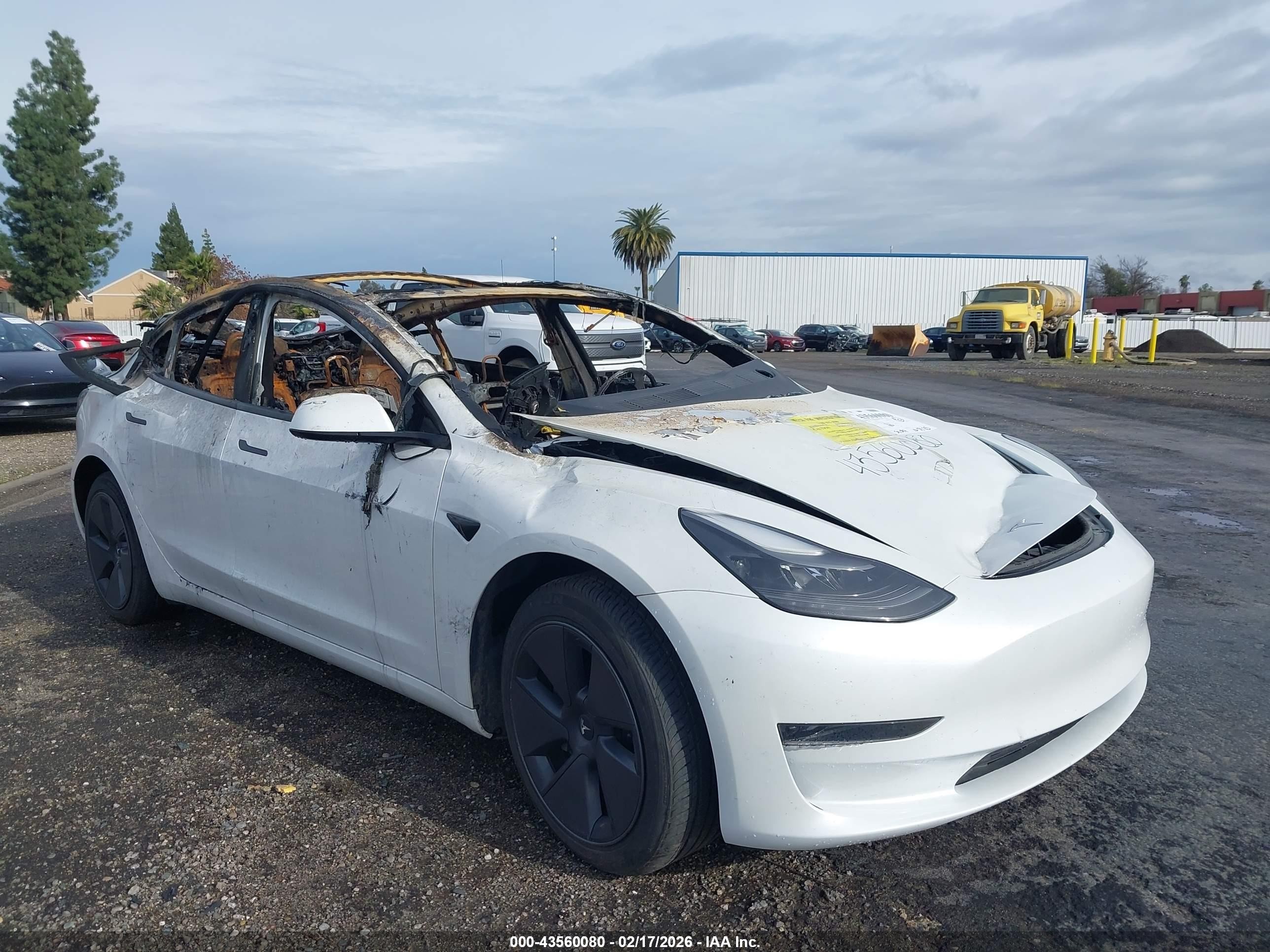 2023 Tesla Model 3, VIN 5YJ3E1EAXPF432032 — Burn