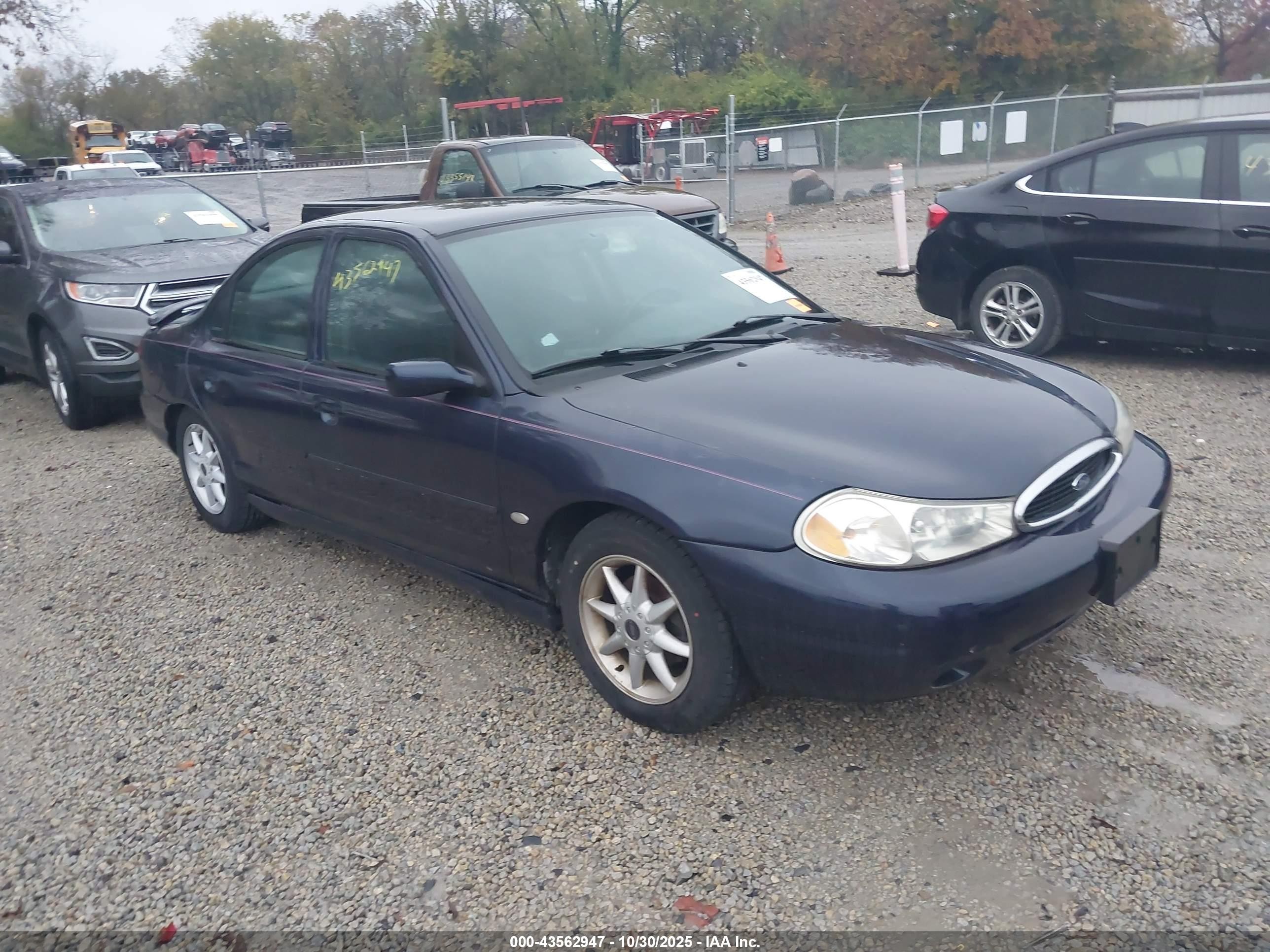 1999 Ford Contour LX, VIN 1FAFP66L3XK142258 — Rear end