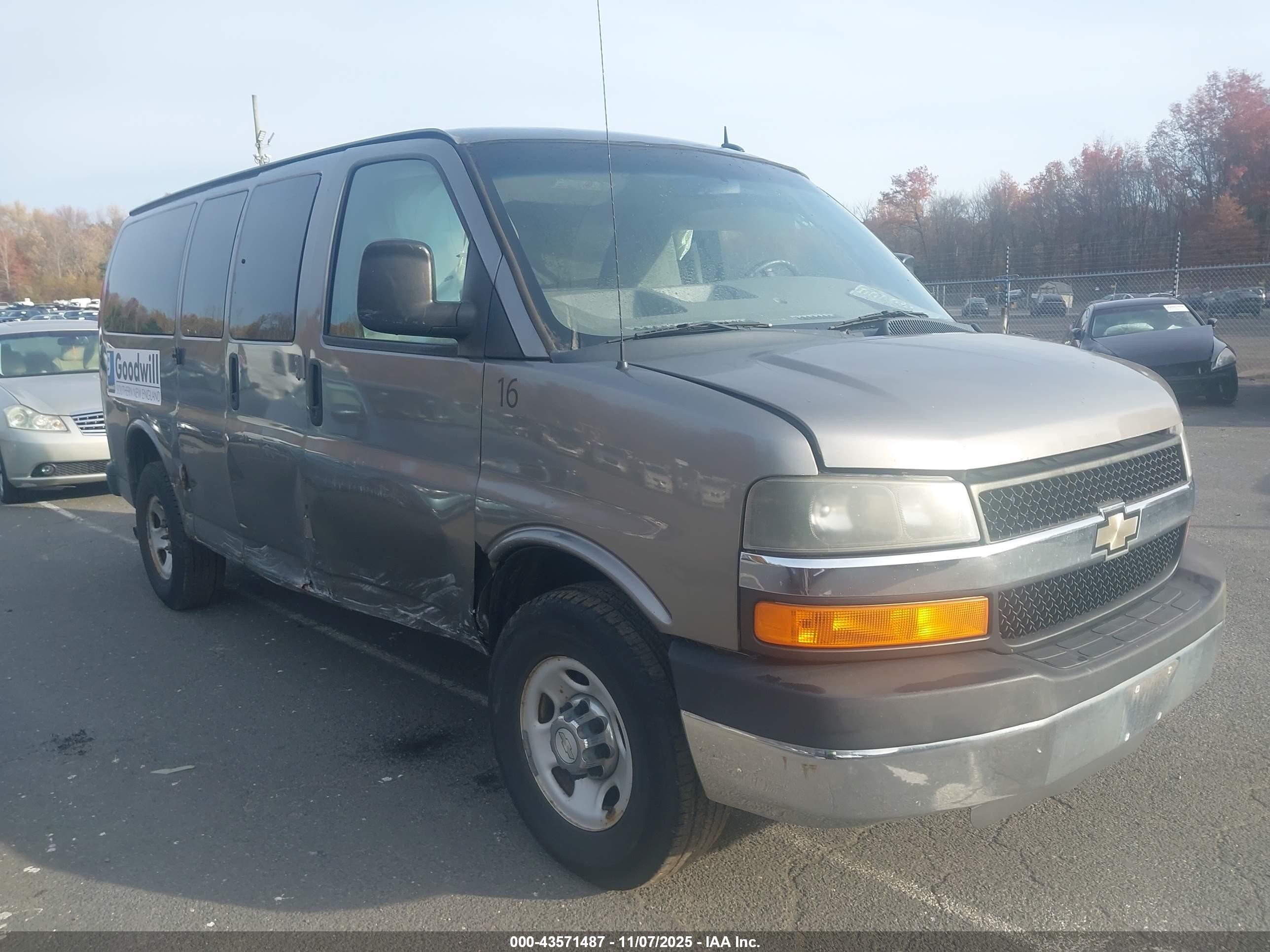 2011 Chevrolet Express 2500, VIN 1GNWGRFA2B1125872 — Side