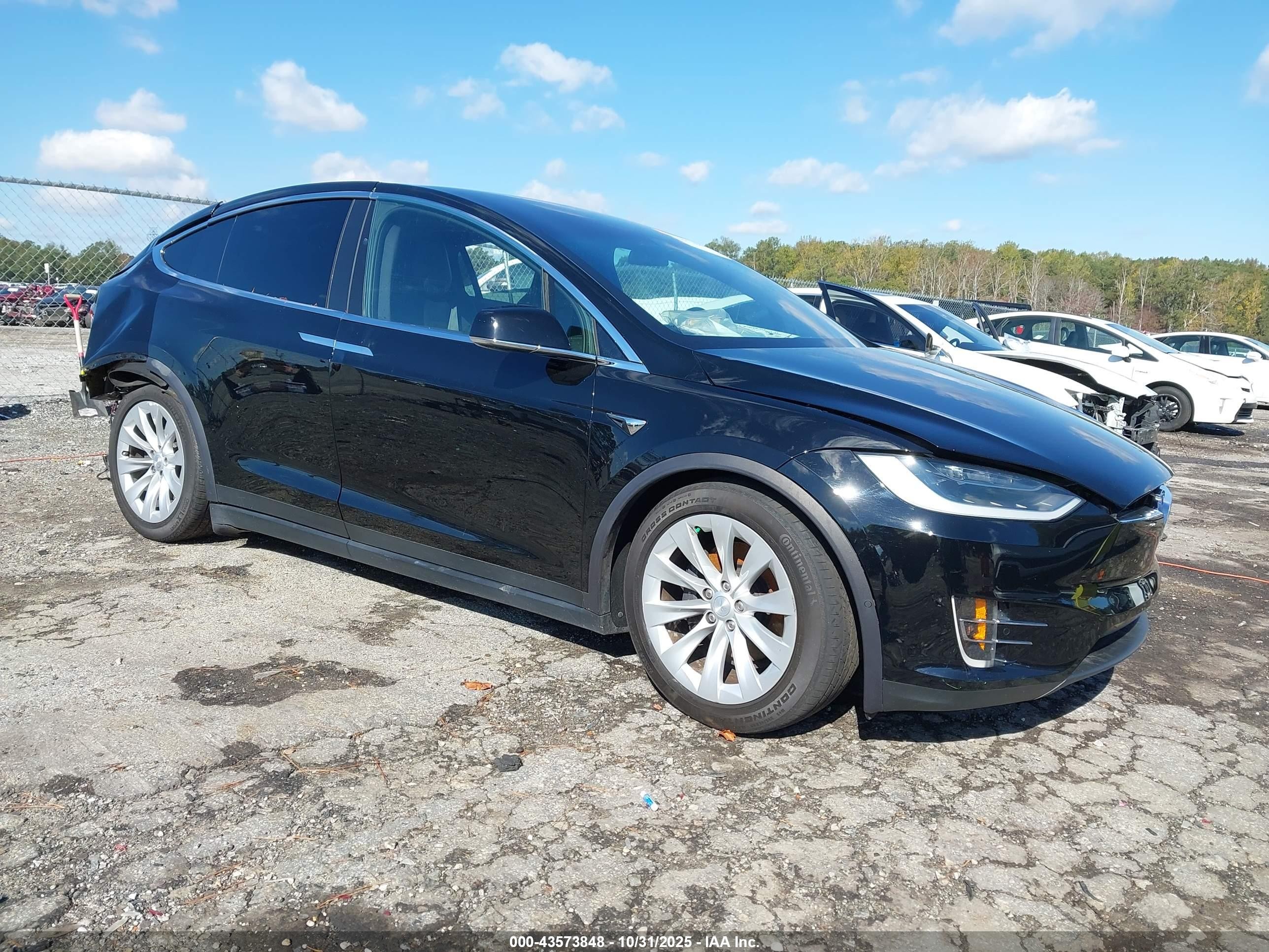 2019 Tesla Model X 75D, VIN 5YJXCAE24KF154544 — Rear end