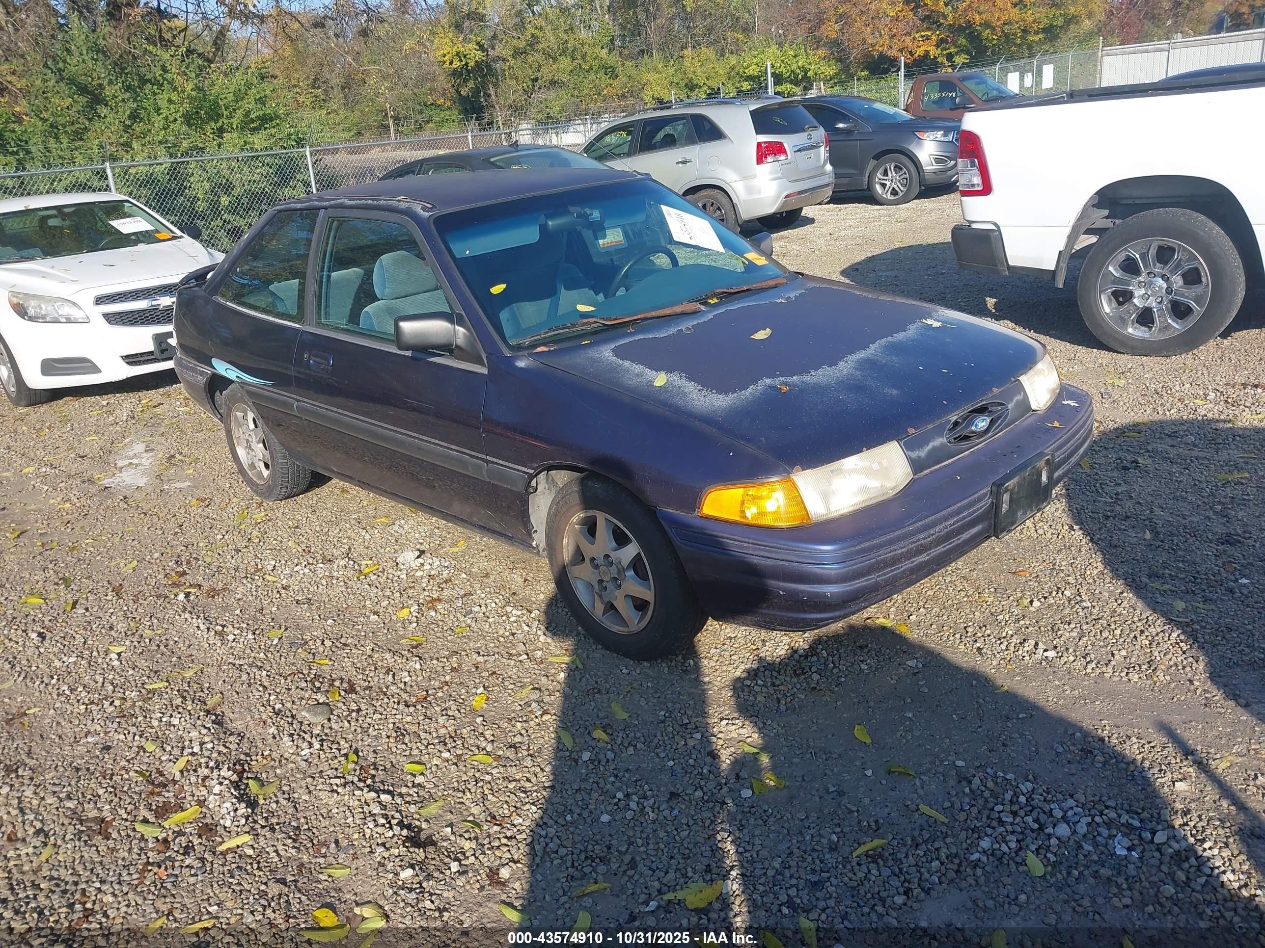 1996 Ford Escort, VIN 3FASP11JXTR132873 — Side