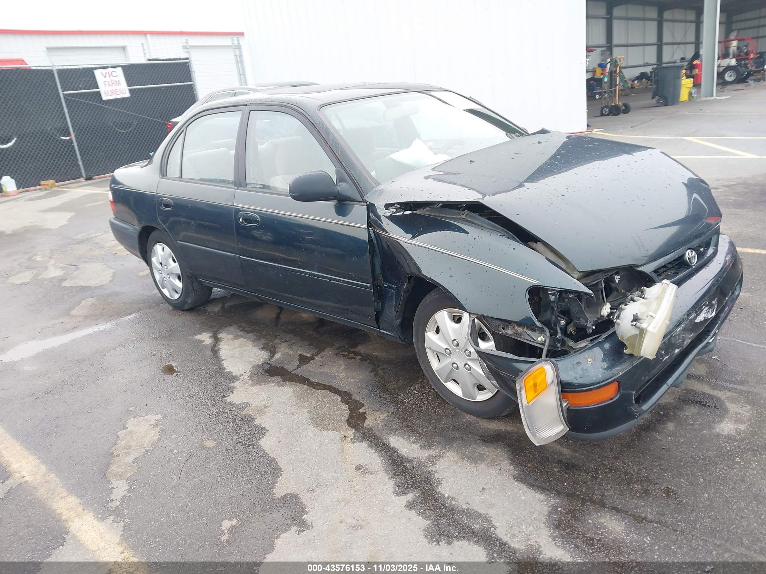 1997 Toyota Corolla DX, VIN 1NXBB02E0VZ553660 — Front end