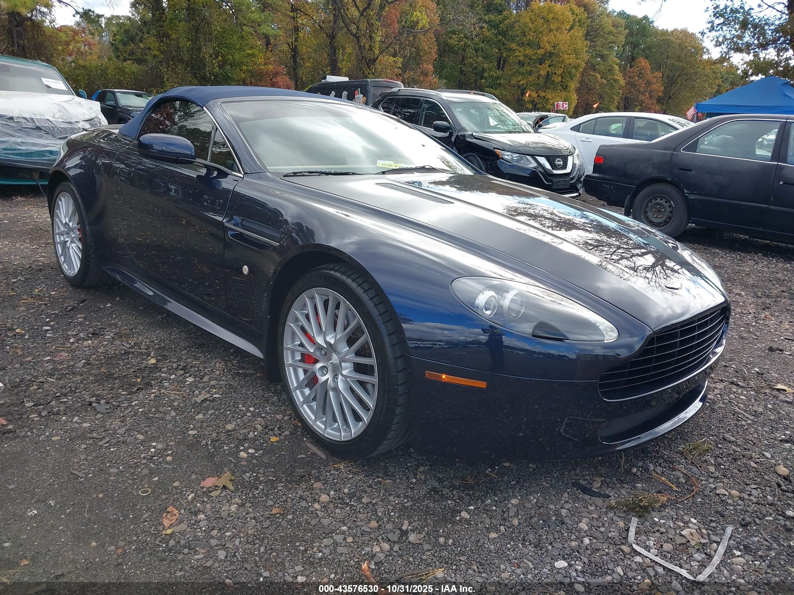 2009 Aston Martin Vantage, VIN SCFBF04C99GD12032 — Зад