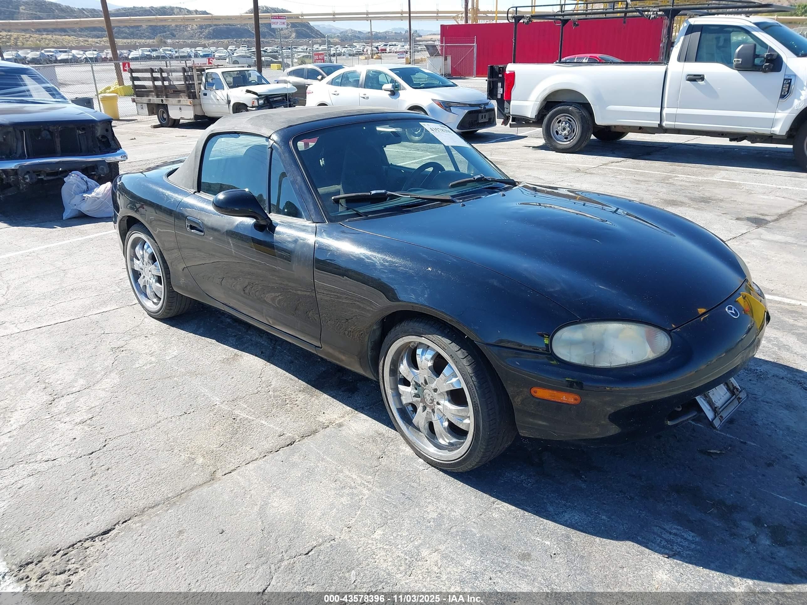 1999 Mazda MX-5 Miata, VIN JM1NB3534X0100990 — Burn
