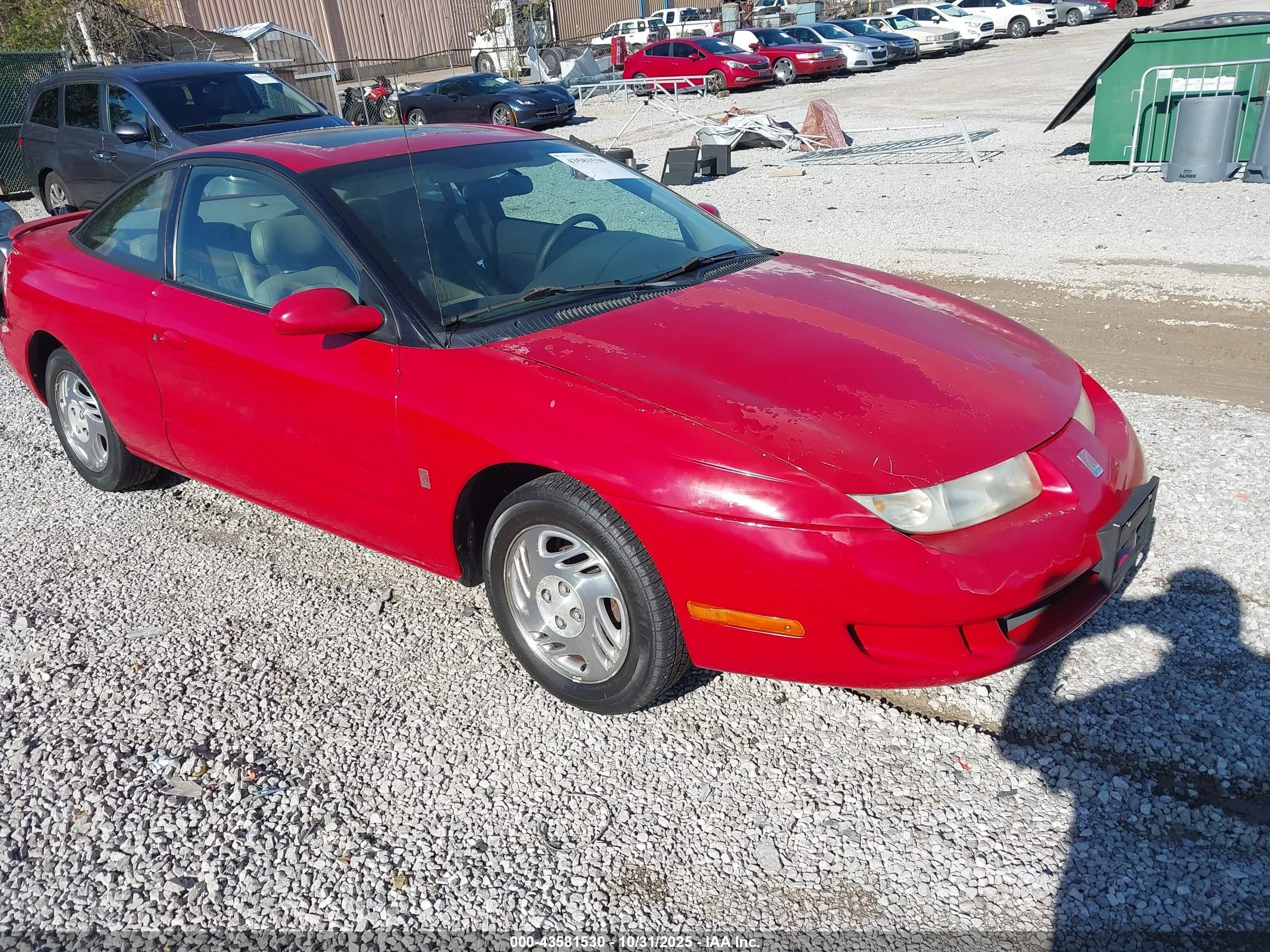 2000 Saturn SC, VIN 1G8ZY1279YZ103628 — Front end