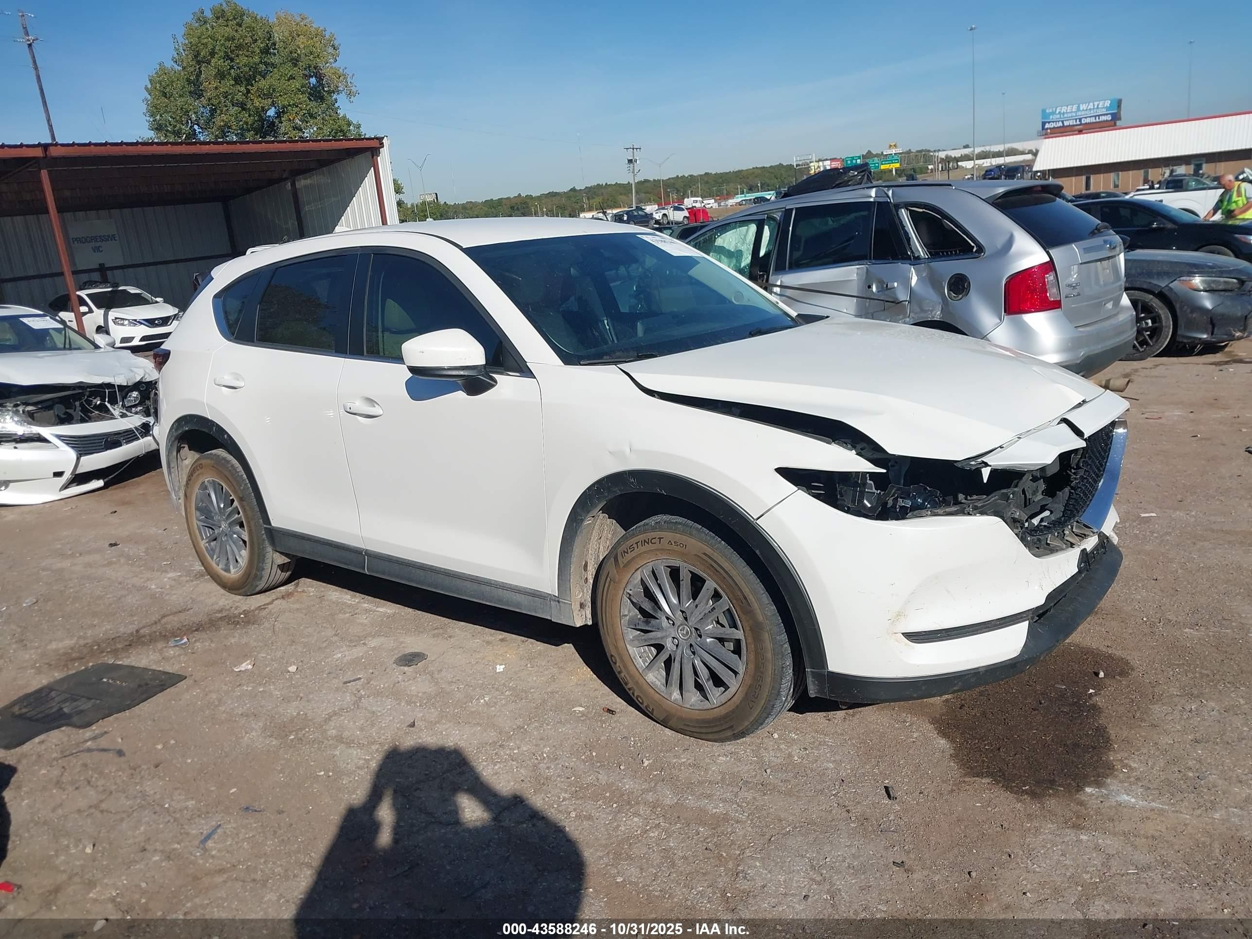 2020 Mazda CX-5 Touring, VIN JM3KFACM5L0773439 — Front end