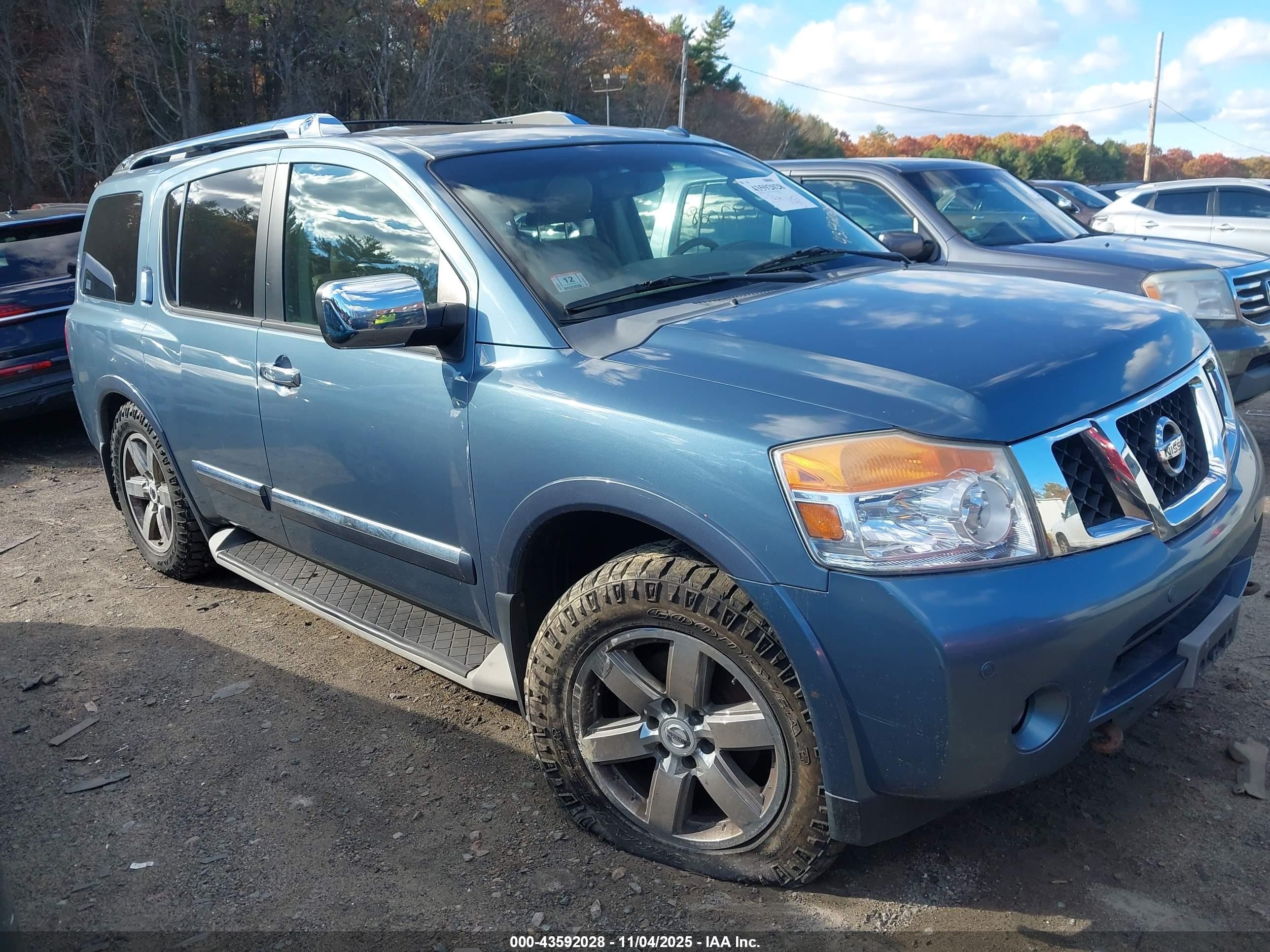 2012 Nissan Armada Platinum, VIN 5N1AA0NC7CN606838 — Side