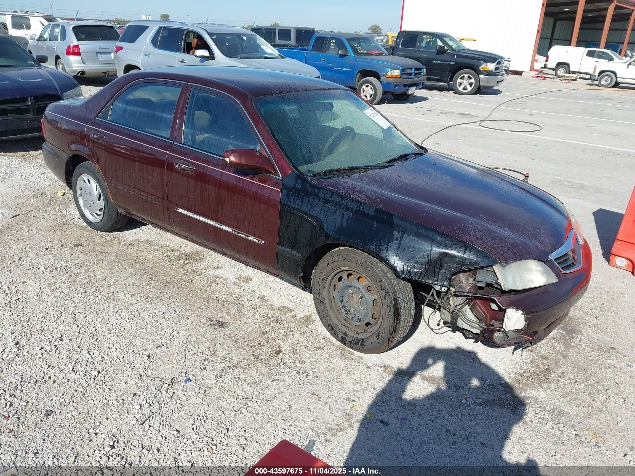 2001 Mazda 626 LX, VIN 1YVGF22D815201913 — Перед