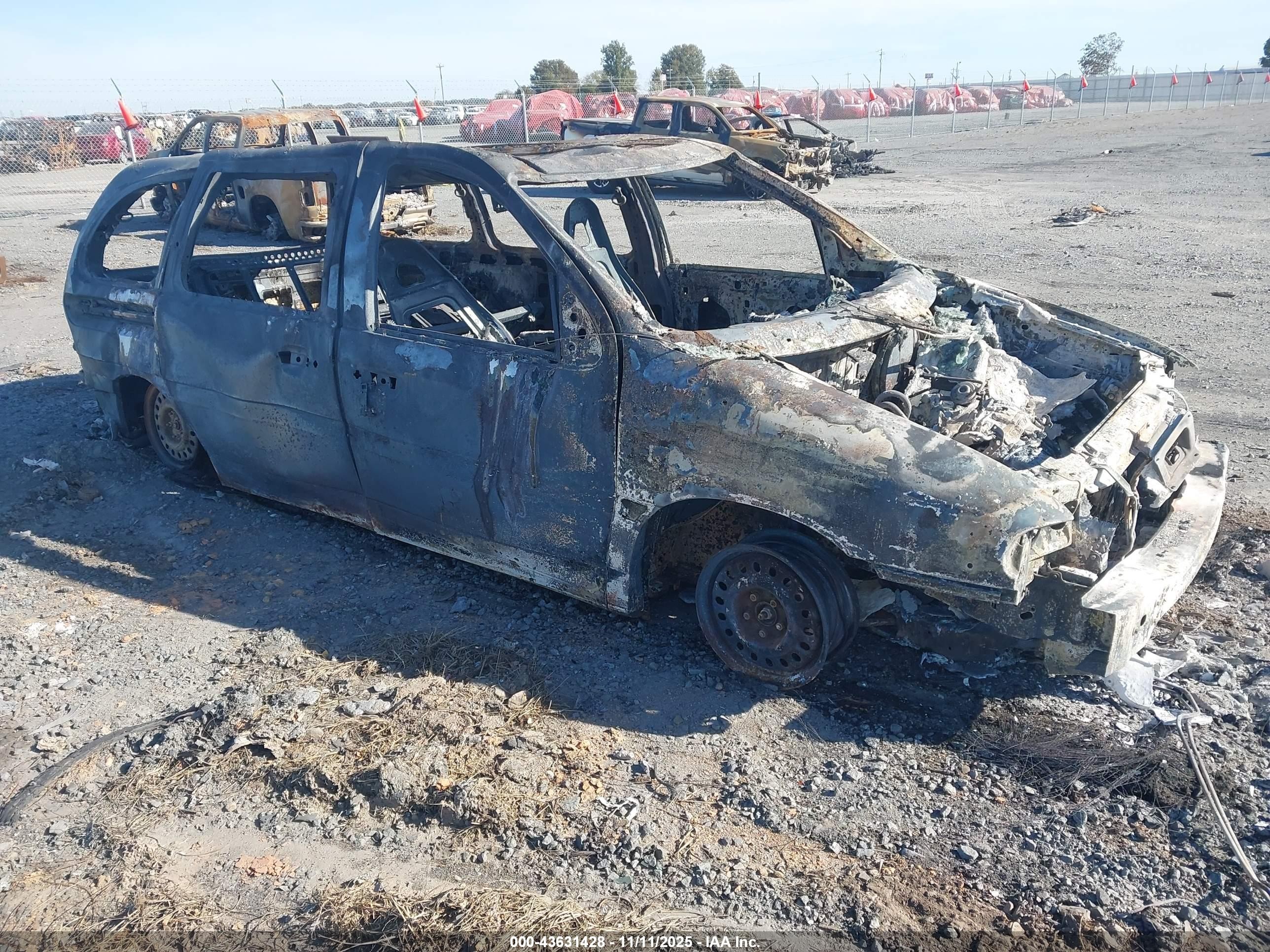 1995 Ford Windstar GL, VIN 2FMDA5149SBA79002 — Burn