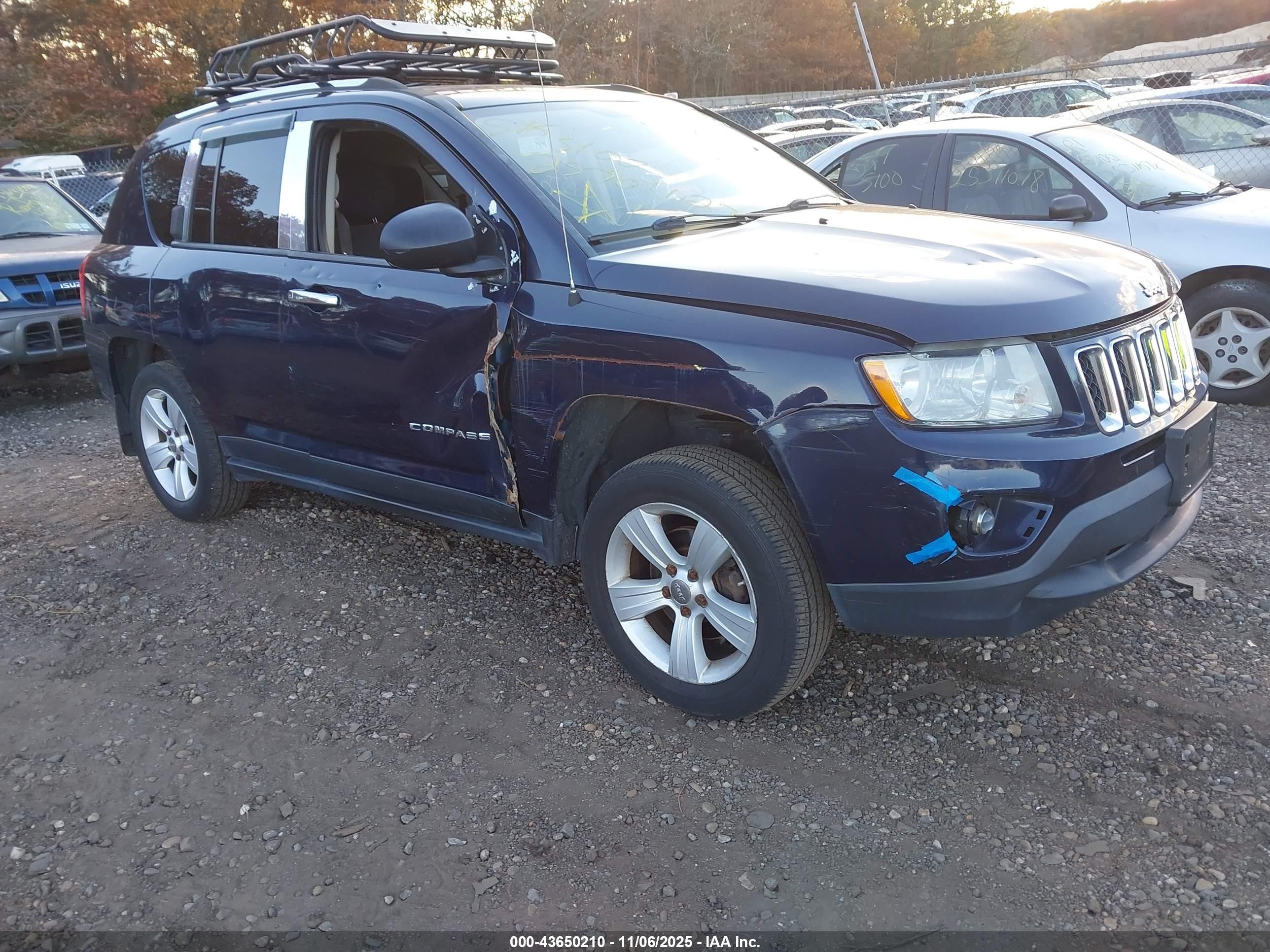 2012 Jeep Compass Latitude, VIN 1C4NJDEB7CD577528 — Side