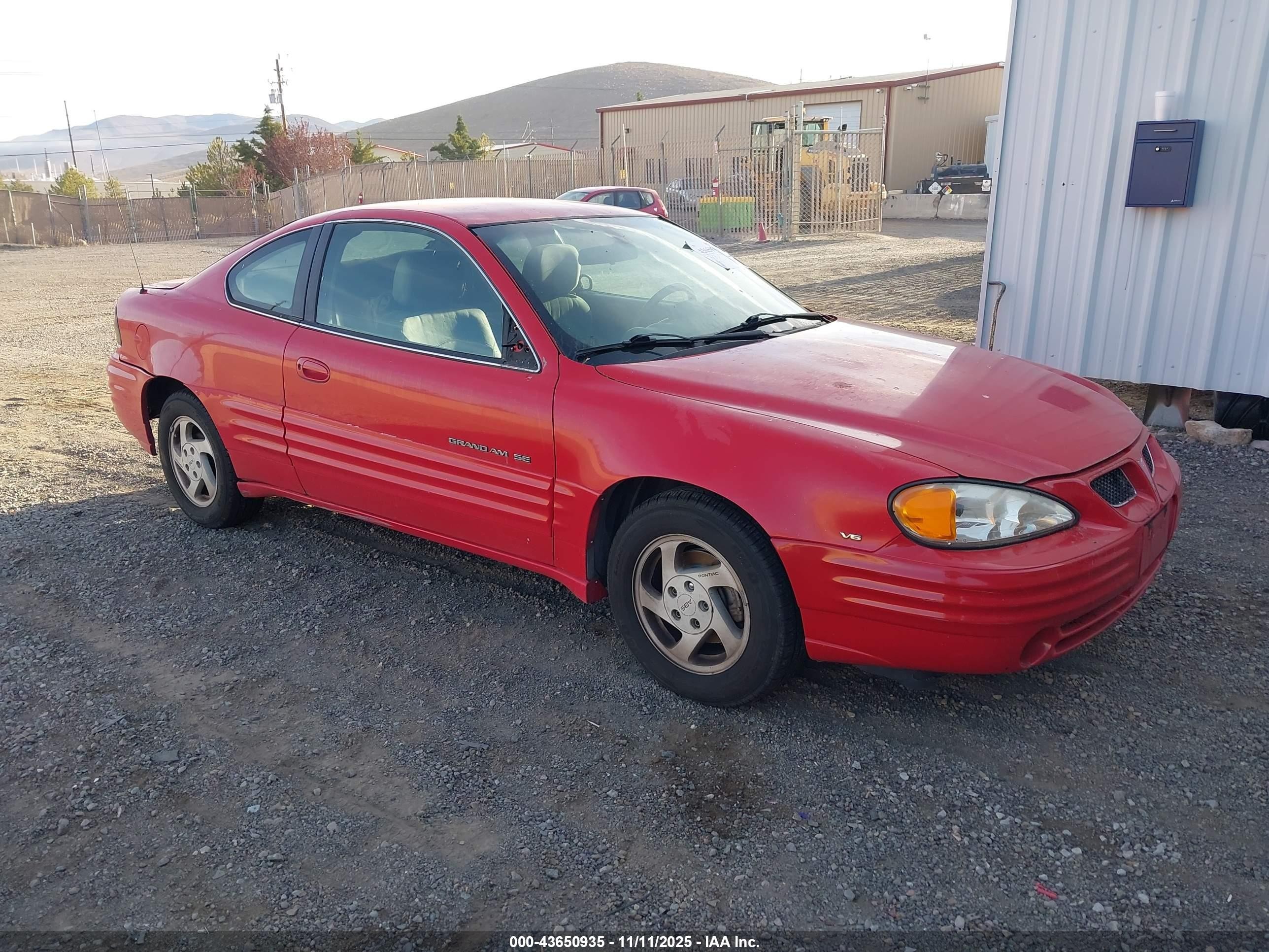 1999 Pontiac Grand Am, VIN 1G2NE12E3XM753289 — Normal wear