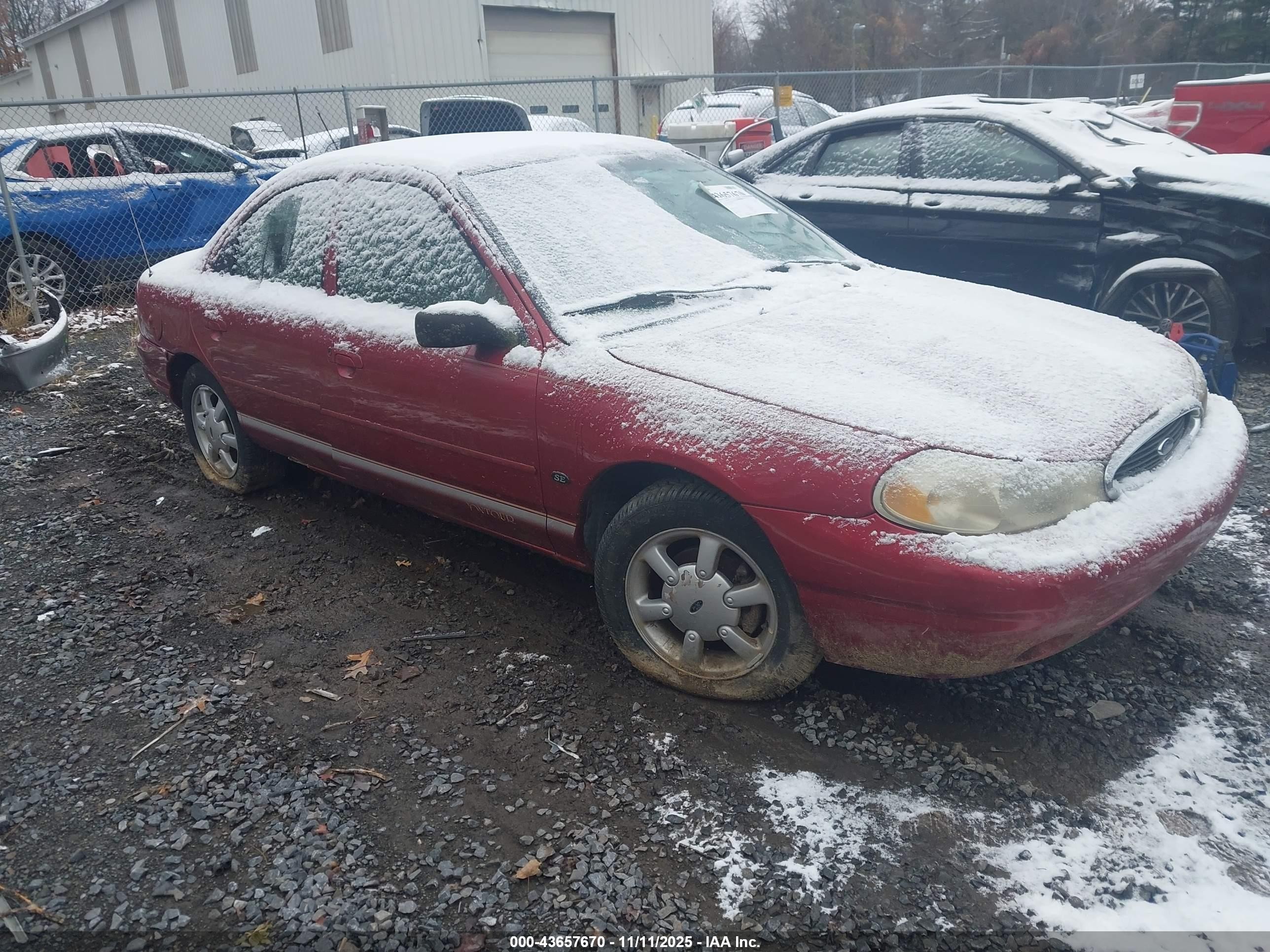 2000 Ford Contour SE Fleet, VIN 1FAFP663XYK123126 — Normal wear