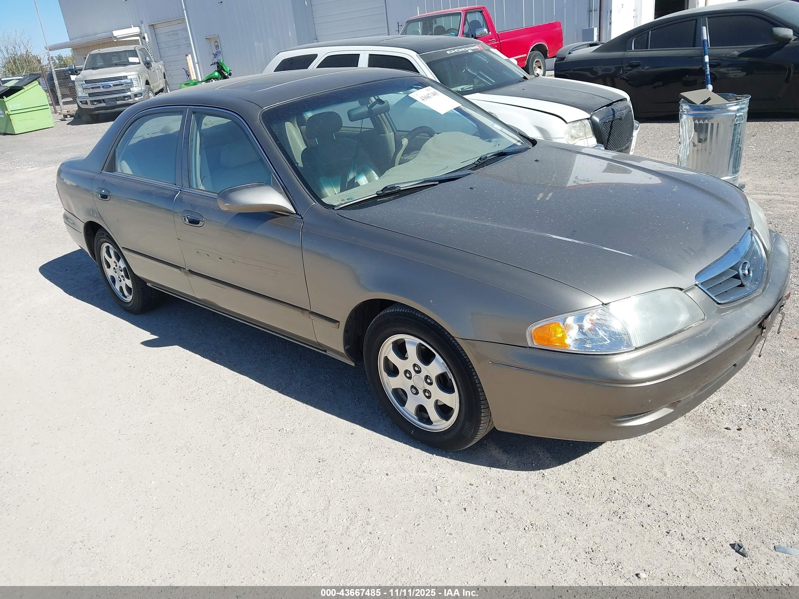 2000 Mazda 626 LX, VIN 1YVGF22C0Y5105162 — Auction photo