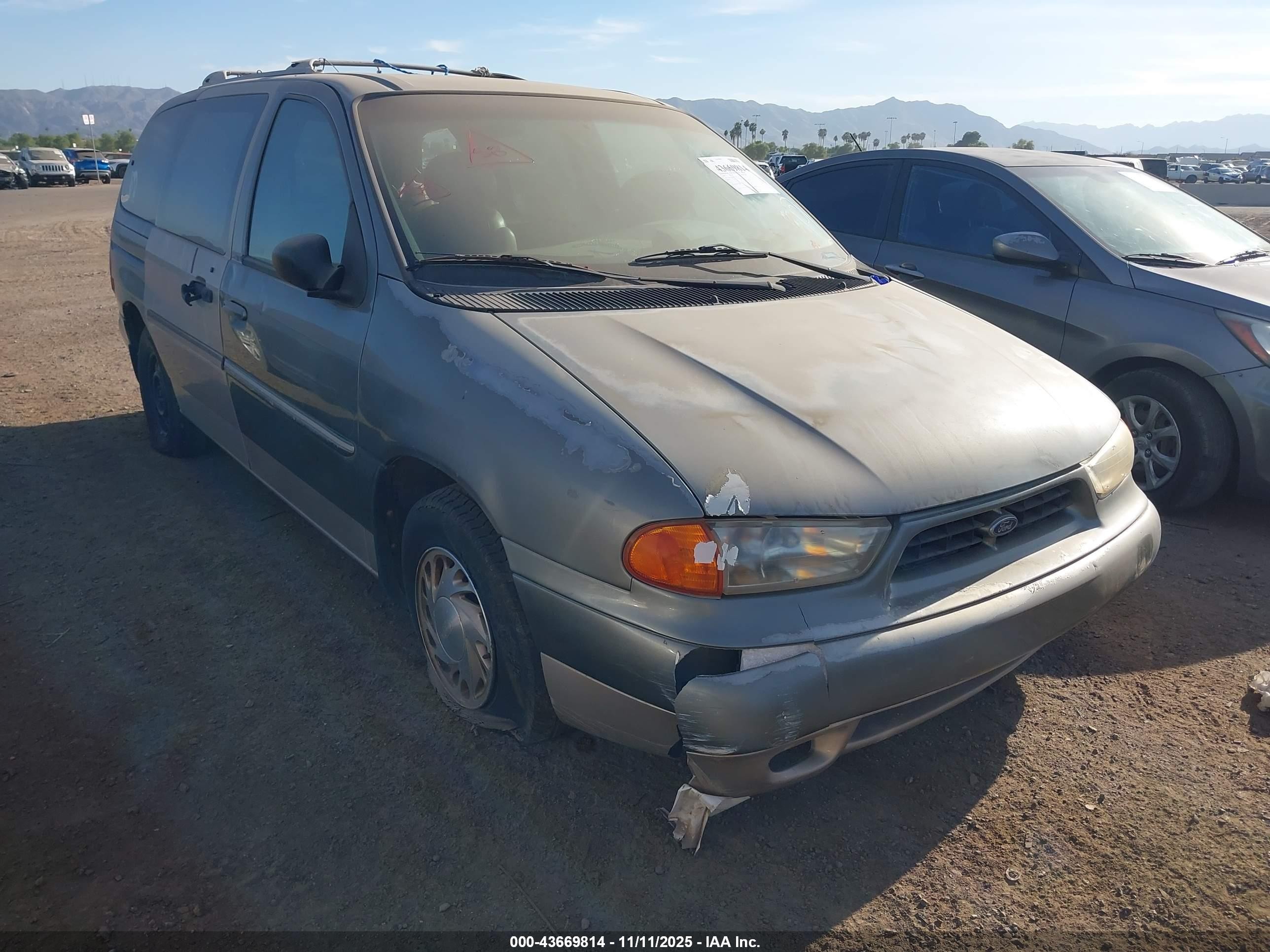 1998 Ford Windstar LX, VIN 2FMZA5146WBD59293 — Side