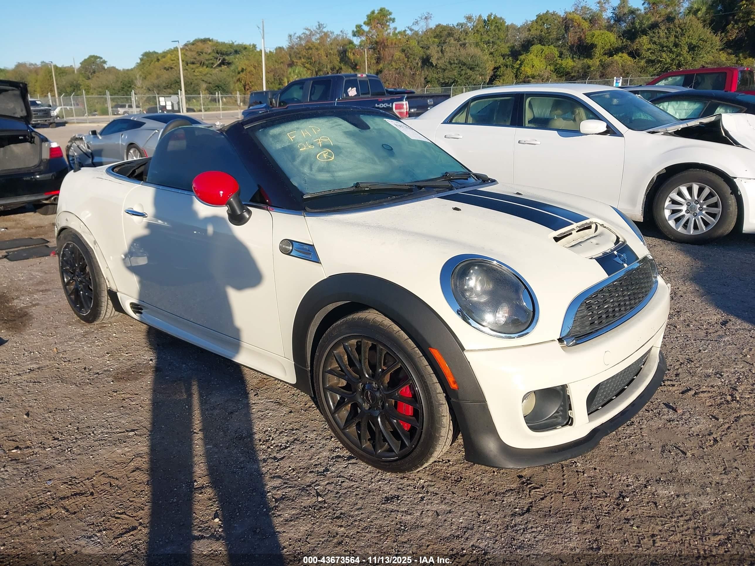 2014 MINI Roadster John Cooper Works, VIN WMWSY9C57ET432679 — Side