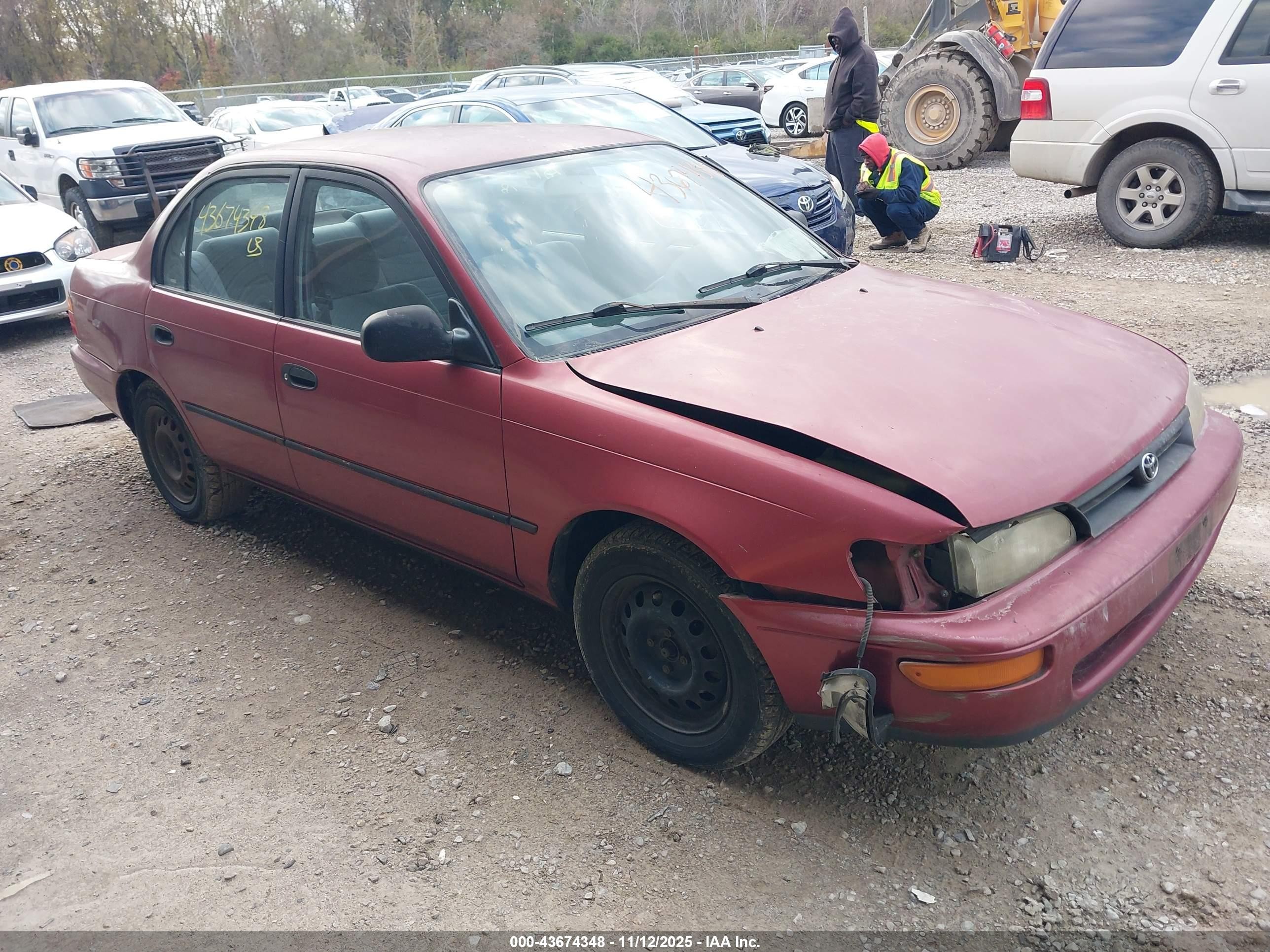 1995 Toyota Corolla DX, VIN 1NXAE09B1SZ347922 — Front end
