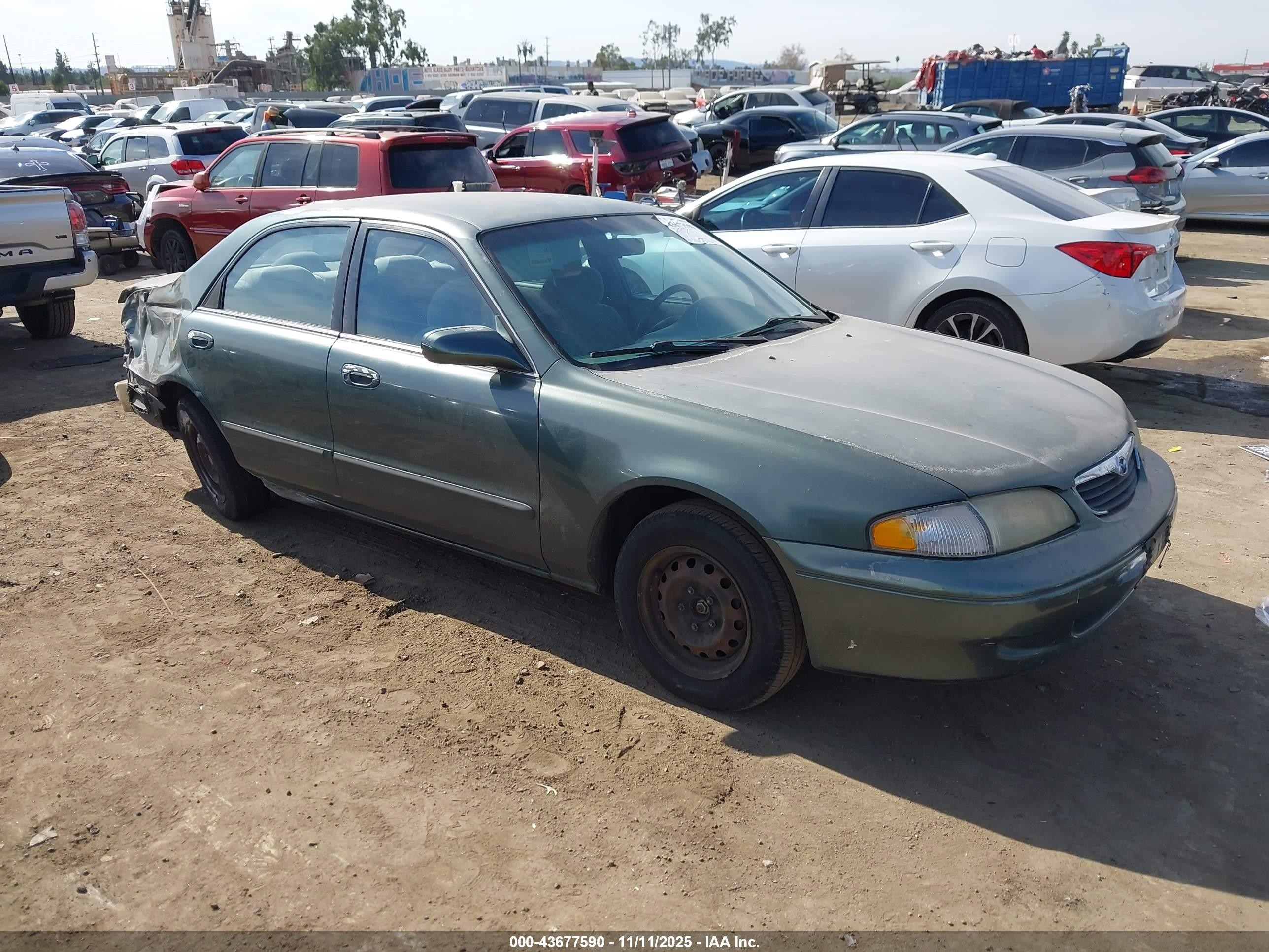 1998 Mazda 626 DX, VIN 1YVGF22C2W5691764 — Rear end