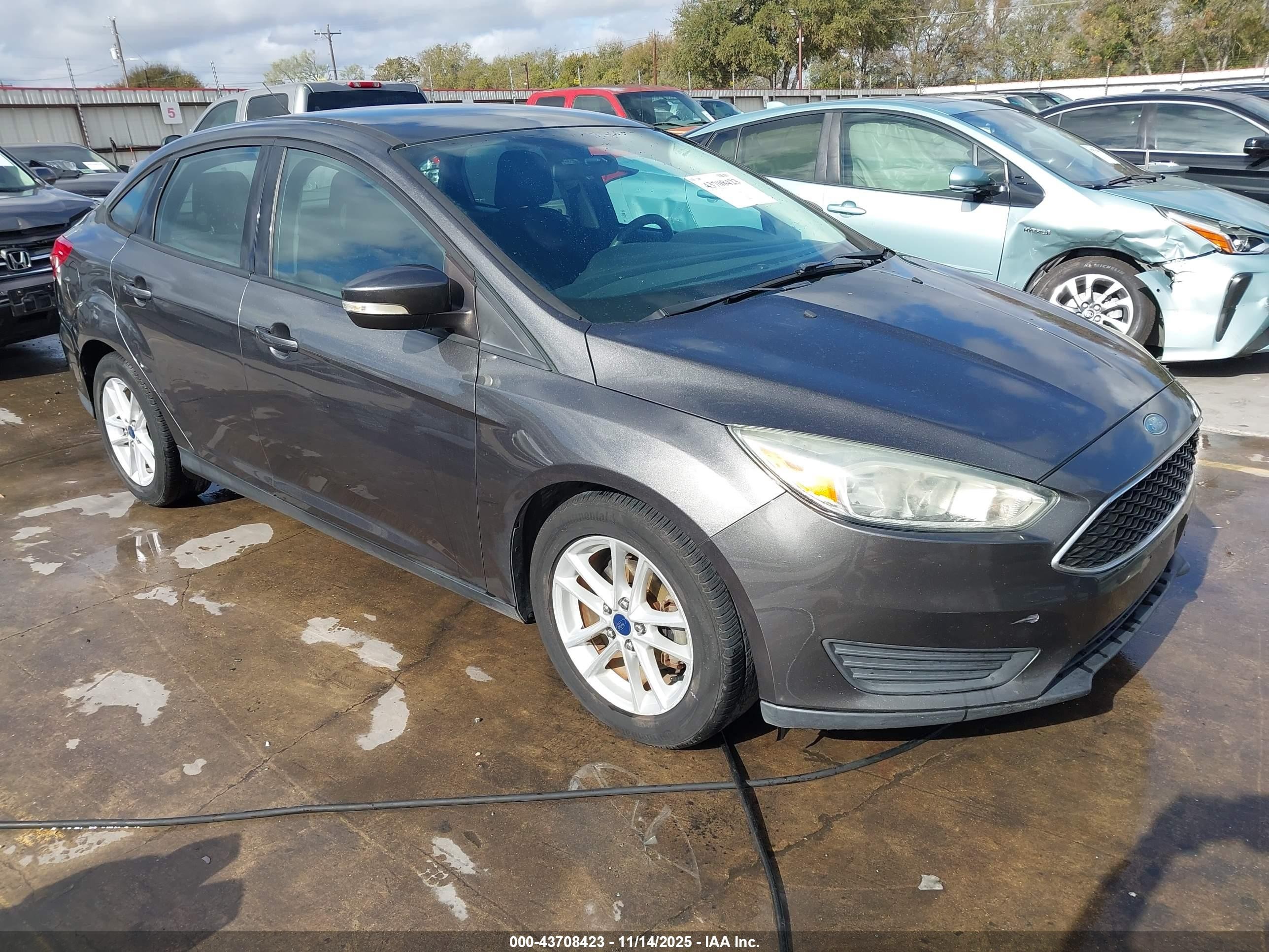 2015 Ford Focus SE, VIN 1FADP3F20FL227242 — Theft recovery