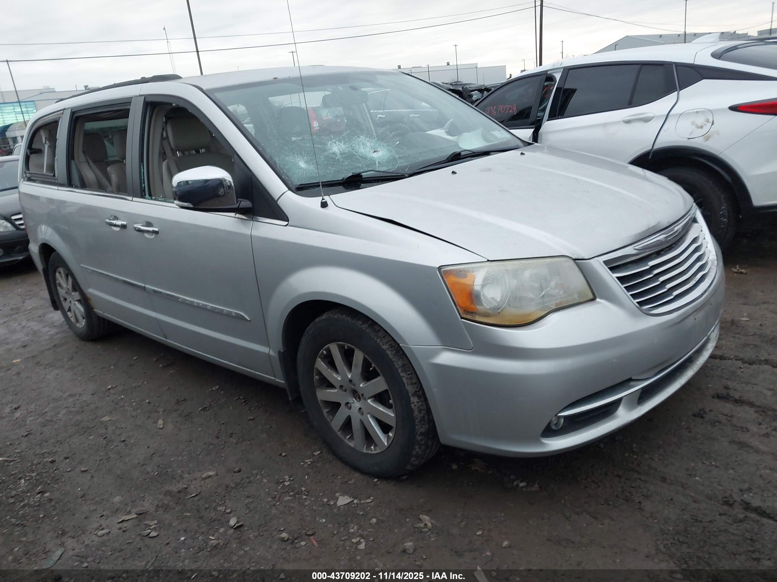 2011 Chrysler Town & Country Touring L, VIN 2A4RR8DG8BR782909 — Vandalism
