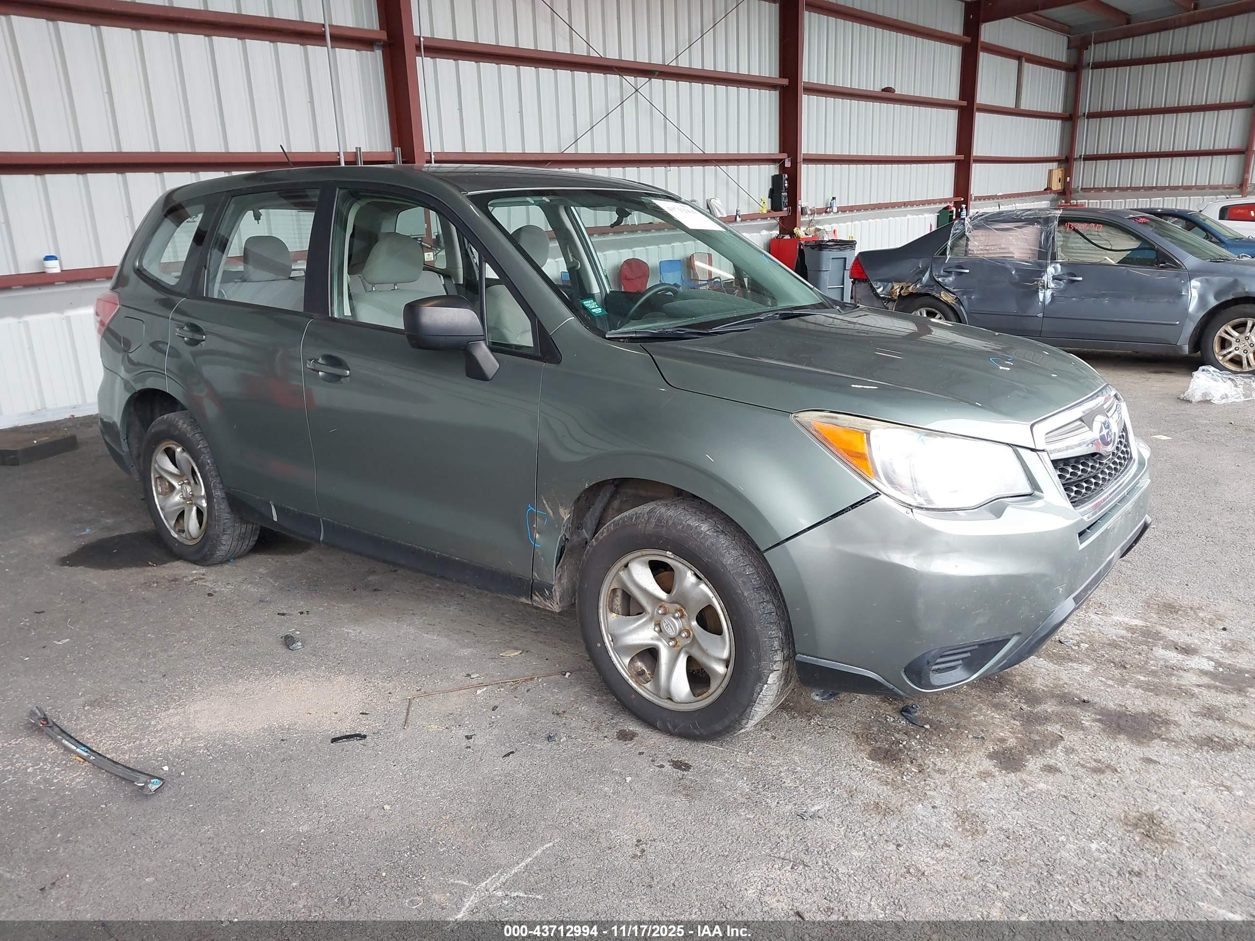2014 Subaru Forester 2.5i, VIN JF2SJAAC9EH411444 — Storm