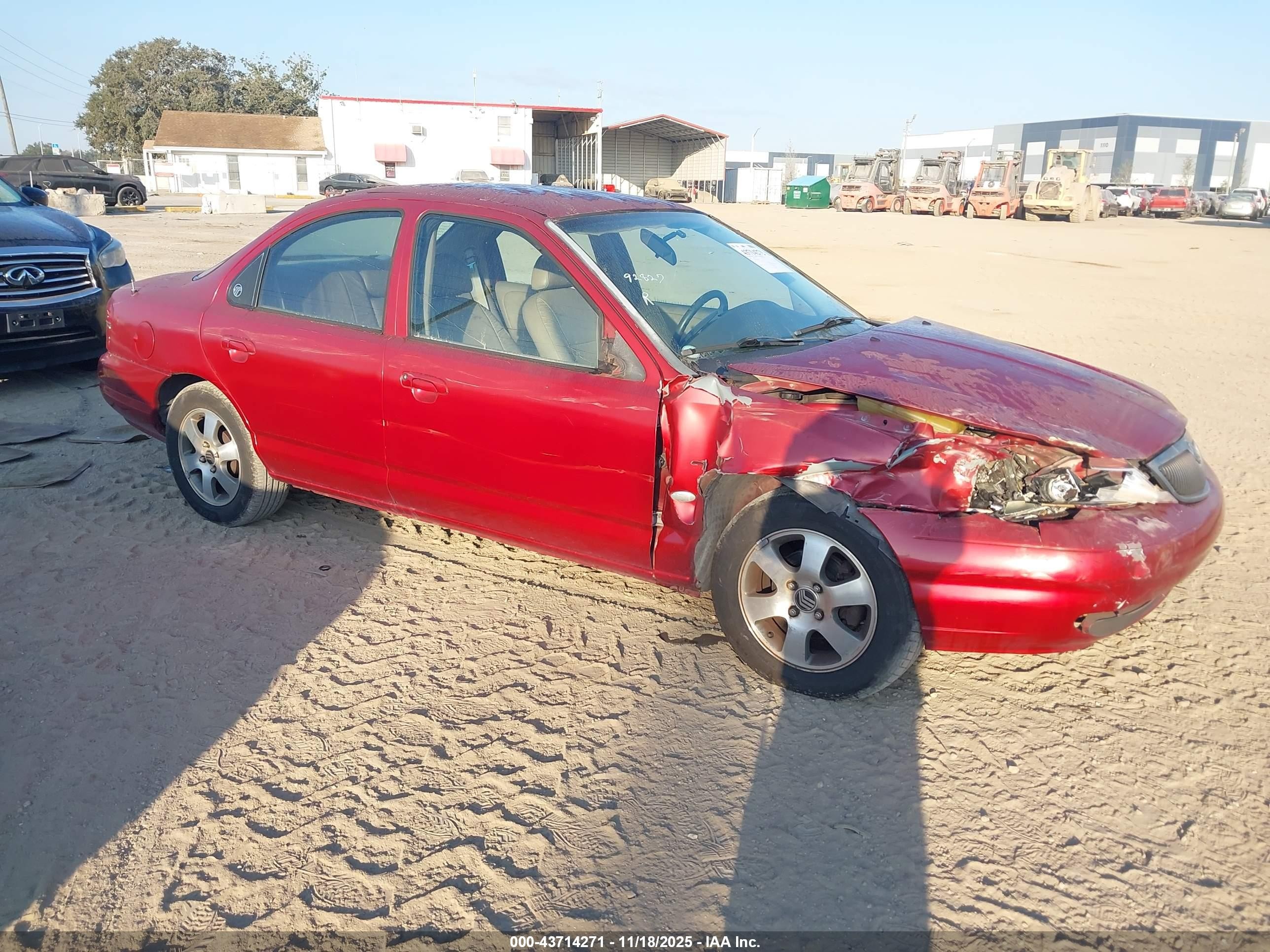 1999 Mercury Mystique, VIN 1MEFM66L8XK608607 — Front end