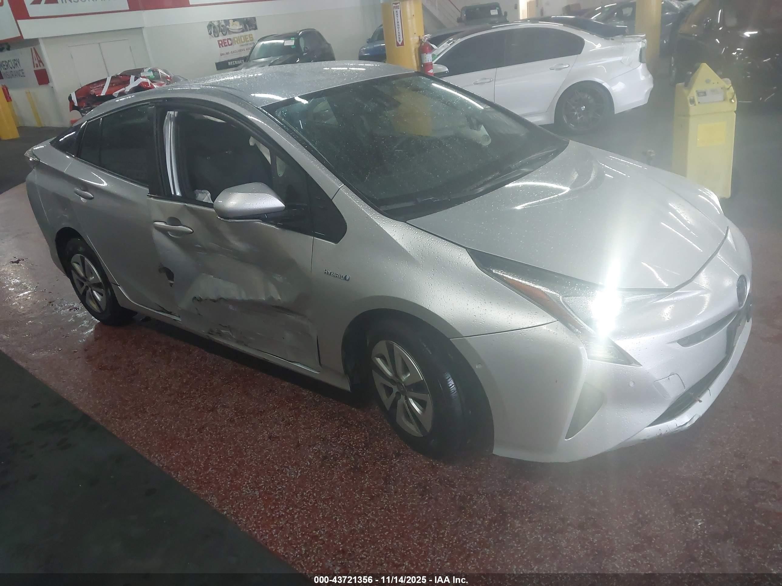 2018 Toyota Prius Two, VIN JTDKBRFU2J3060010 — Side