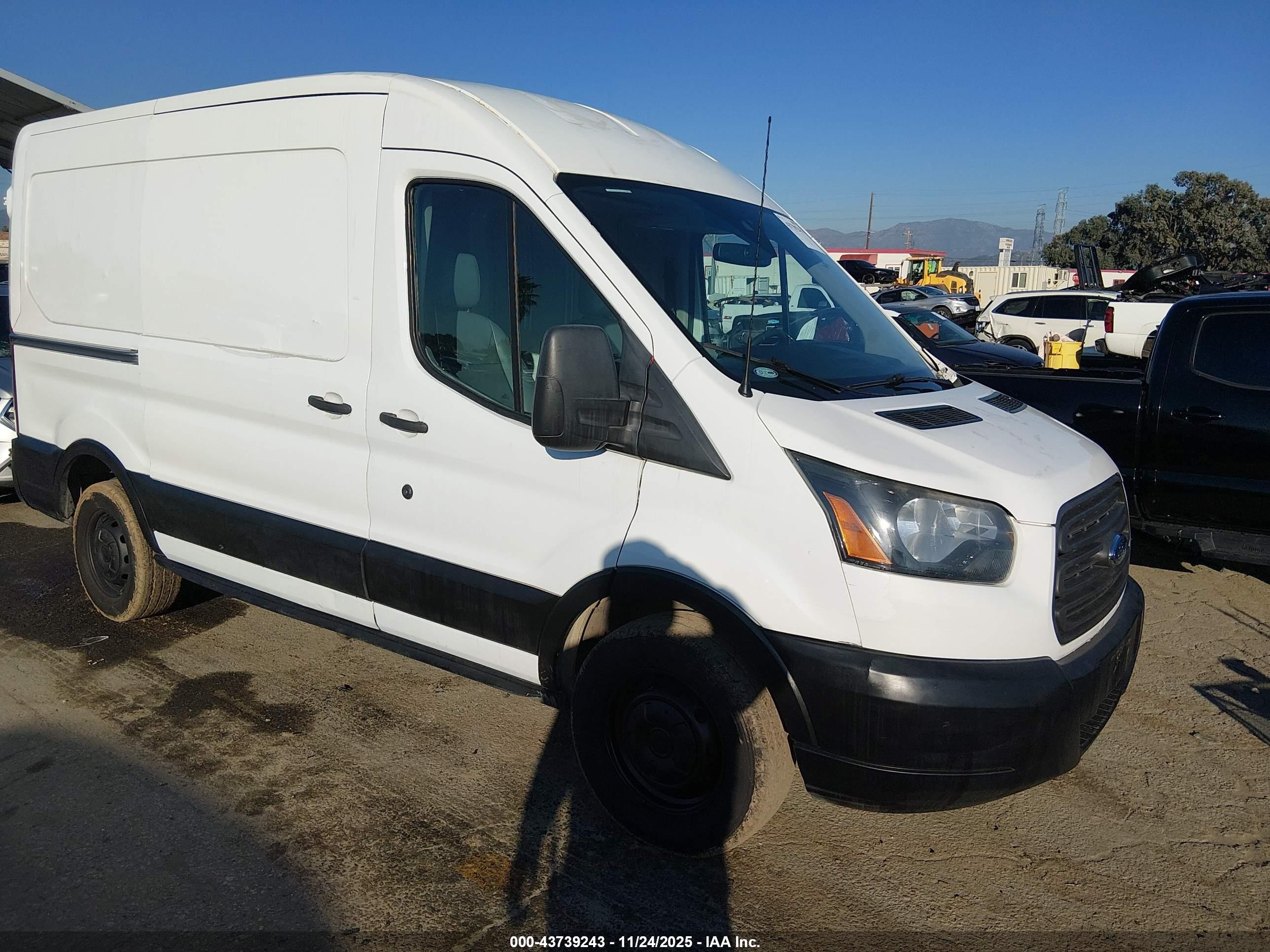 2017 Ford Transit Cargo, VIN 1FTYE1CM3HKA71962 — Side
