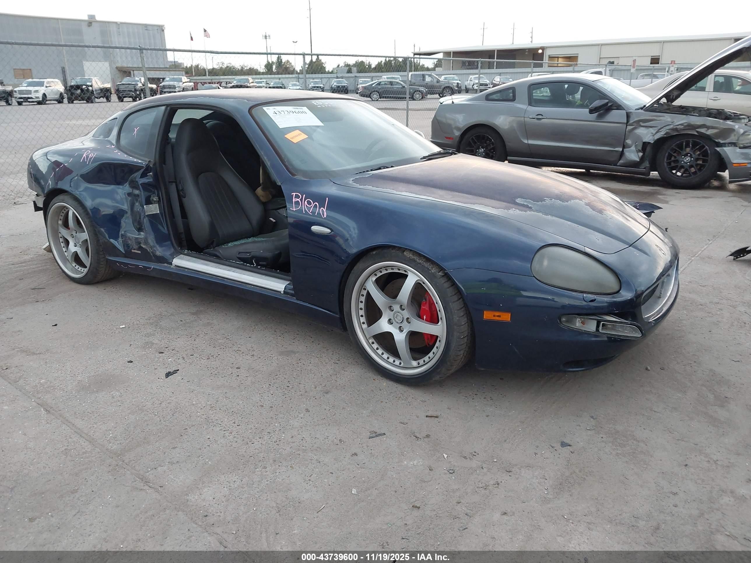 2002 Maserati Coupe, VIN ZAMBC38A920006344 — Side