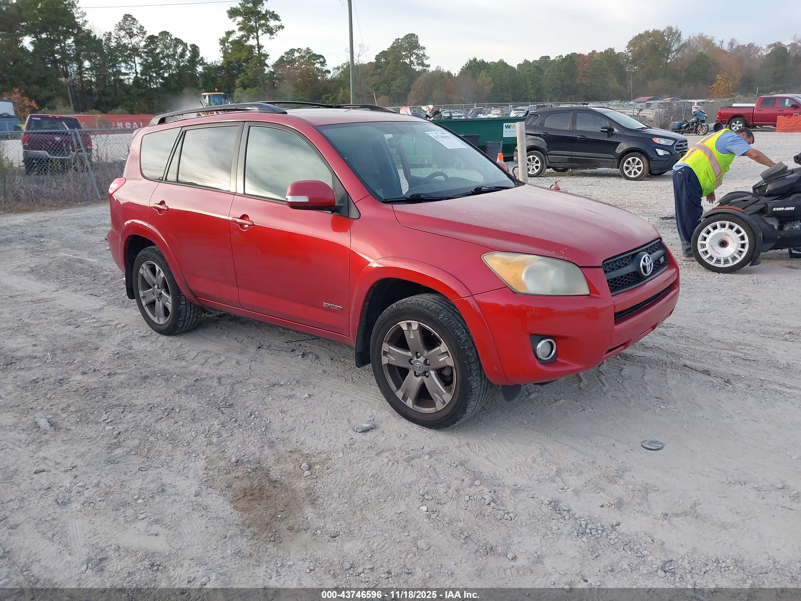 2011 Toyota RAV4 Sport, VIN JTMRK4DVXB5101678 — Side