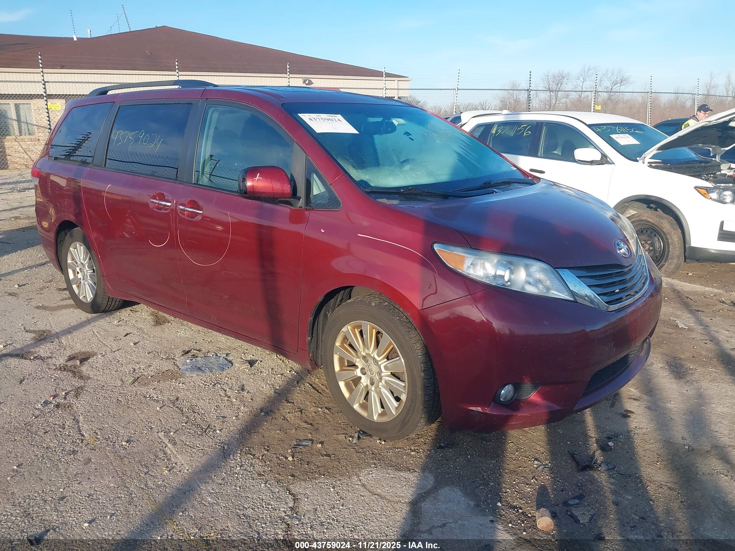 2011 Toyota Sienna Limited, VIN 5TDDK3DCXBS016482 — Side
