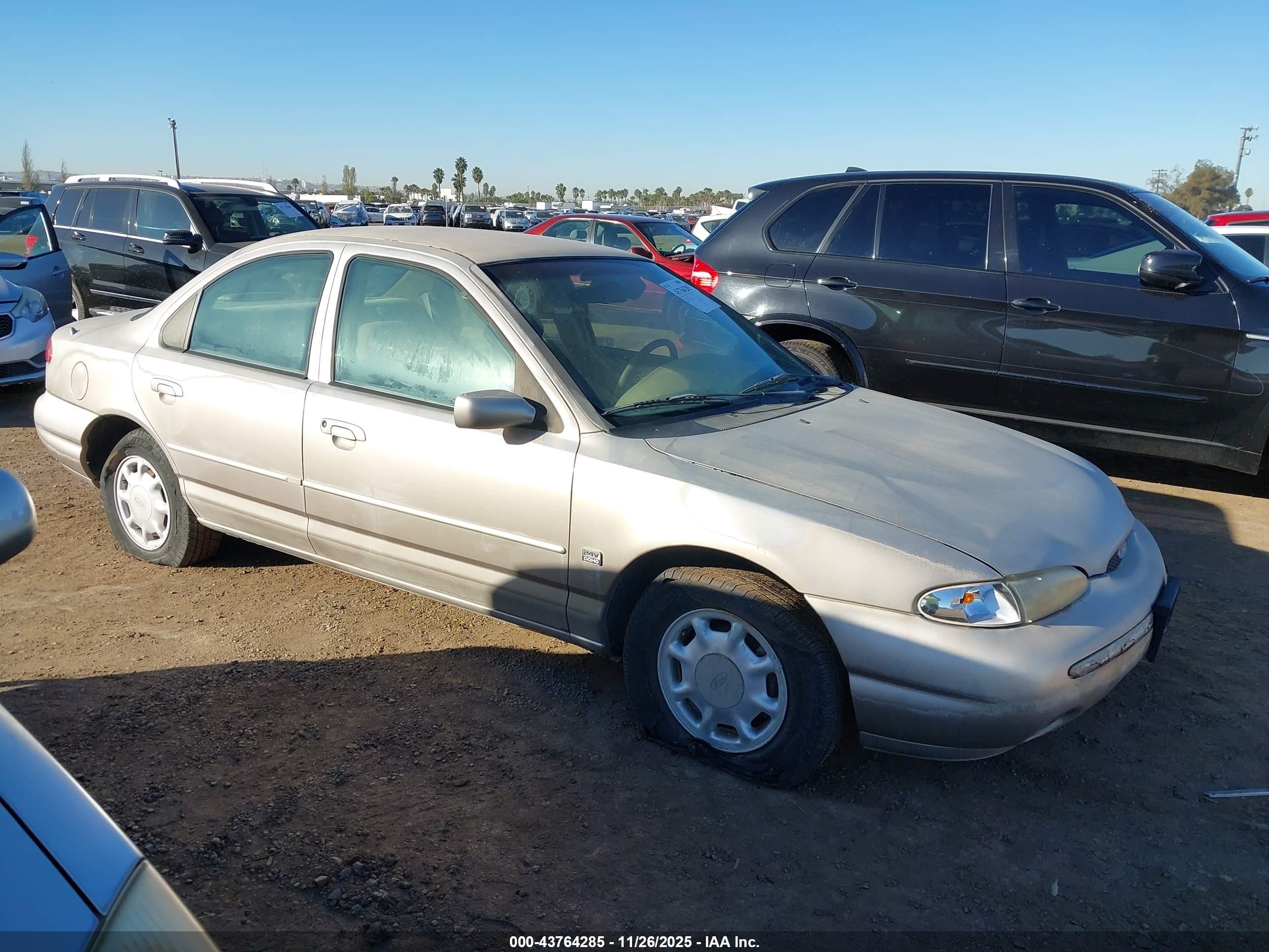 1995 Ford Contour, VIN 1FALP65L0SK170886 — Front end