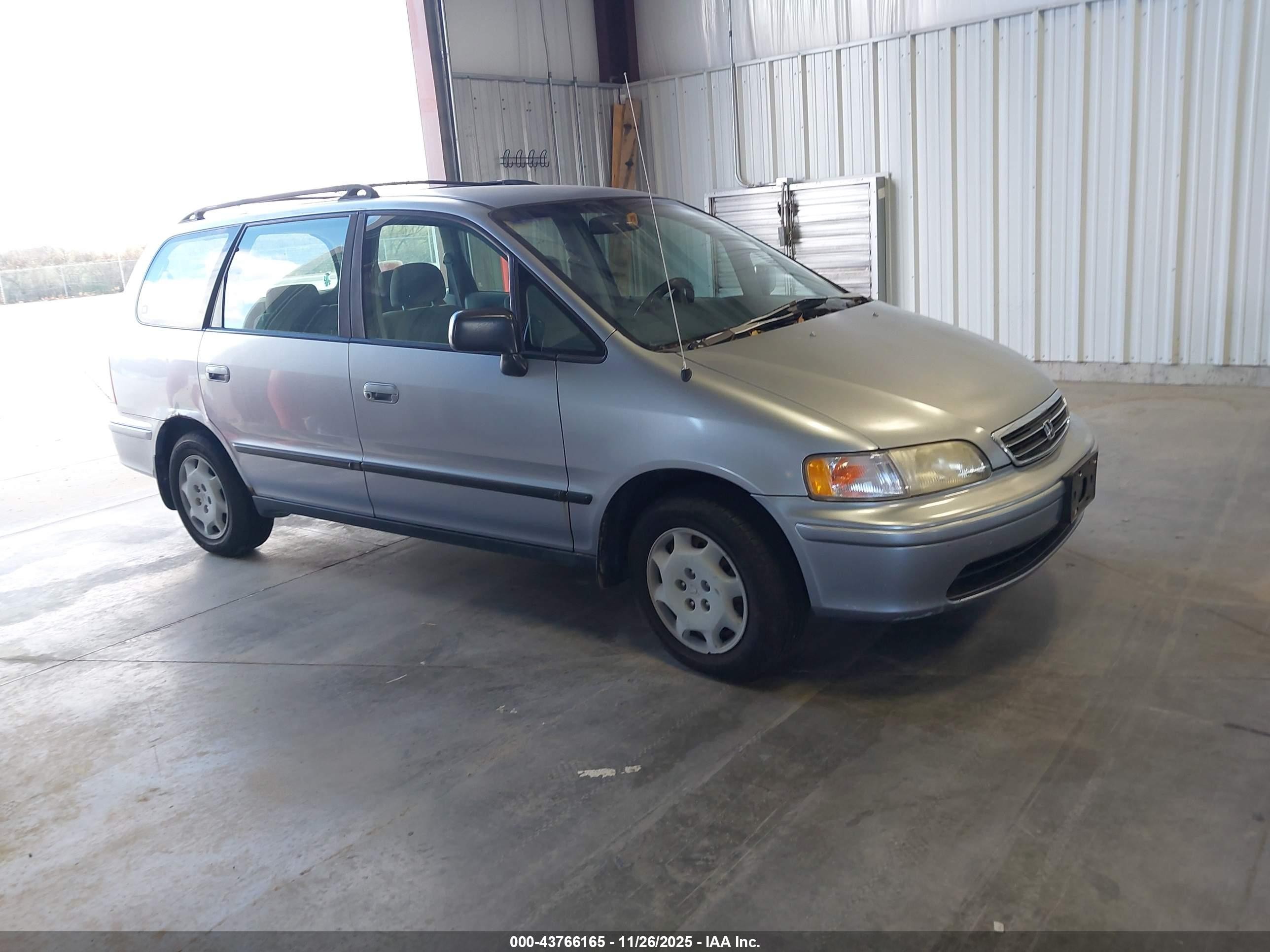 1998 Honda Odyssey LX, VIN JHMRA3867WC006821 — Normal wear